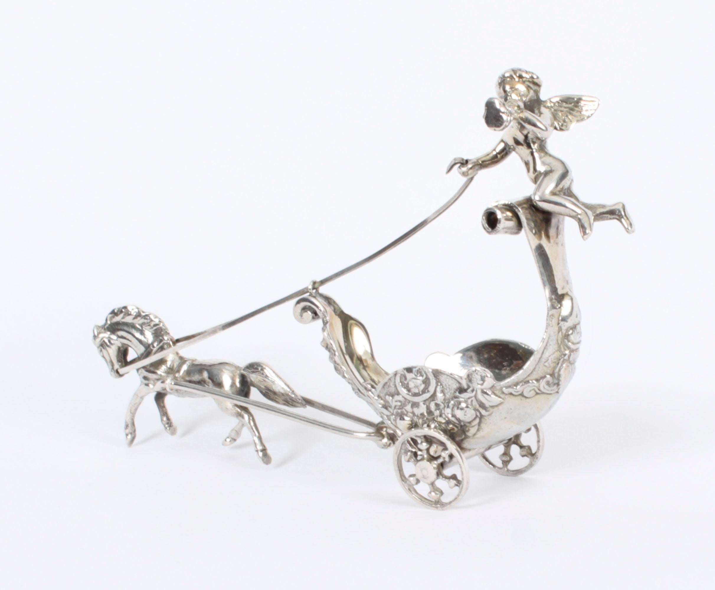This is a wonderful antique Italian .800 silver cherub horse drawn chariot salt, Circa 1900 in date.

Will look amazing on your dining table.

Condition:
In excellent condition with  no dings, dents or signs of repair. Please see photos for