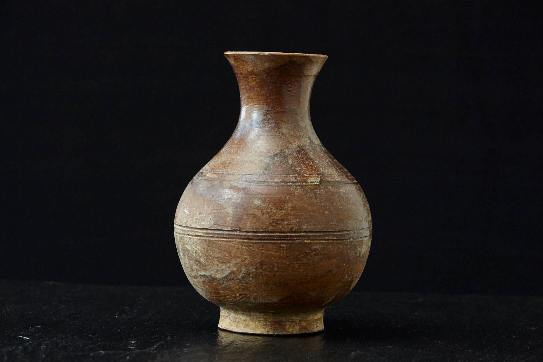 Beautiful antique Italien terra cotta vase with bottle shape and brown glaze, fantastic patina. There are a few very old, almost natural chips by now, to the top rim of the vase from usage over the decades, please refer to the photos. From Sardinia,