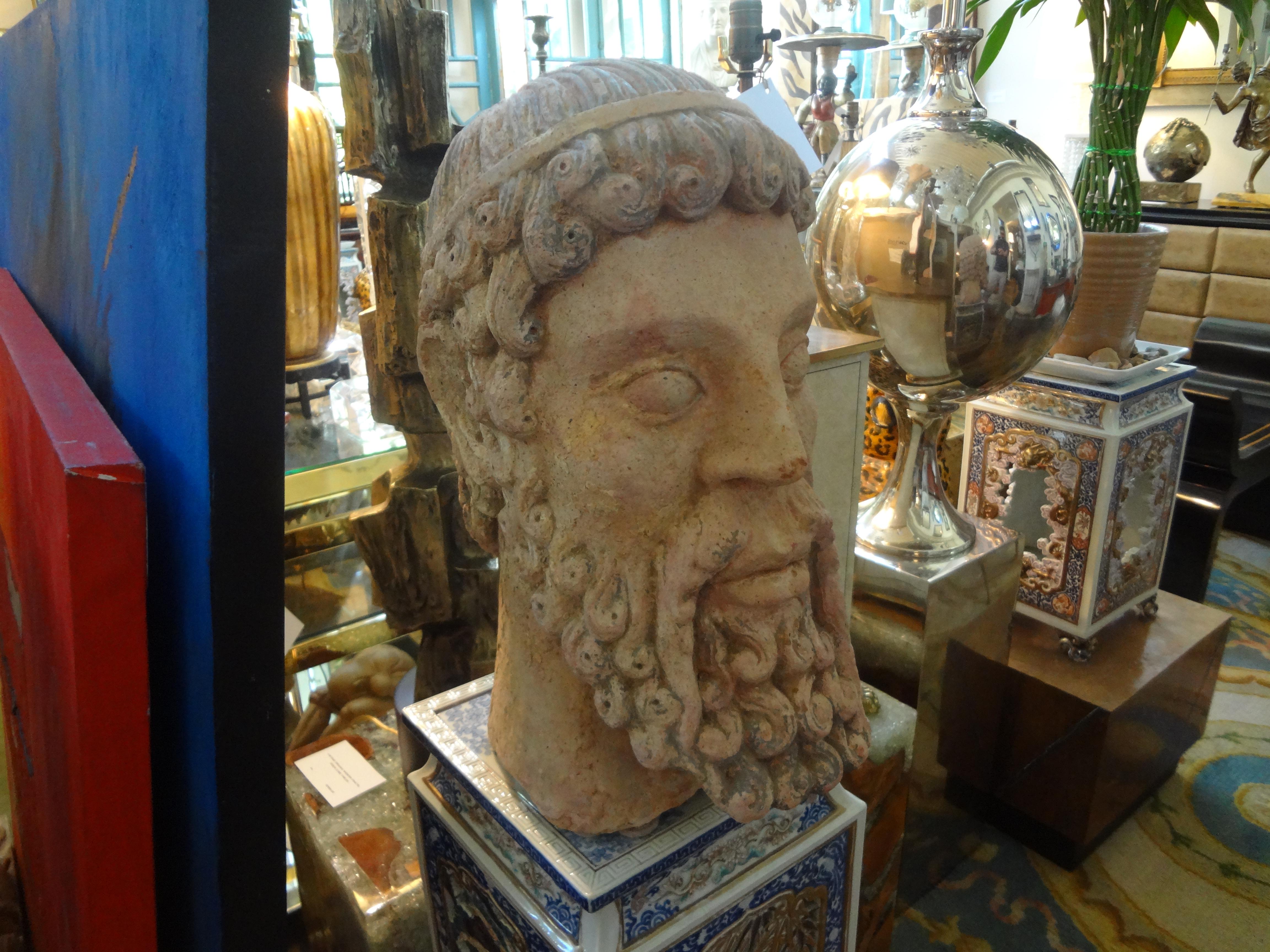 Antique Italian Terracotta bust of a Greco Roman.
Handsome large antique Italian terracotta bust of an ancient Greco Roman. This stunning sculpture is well executed and has some restorations at the base which give it a much older look.