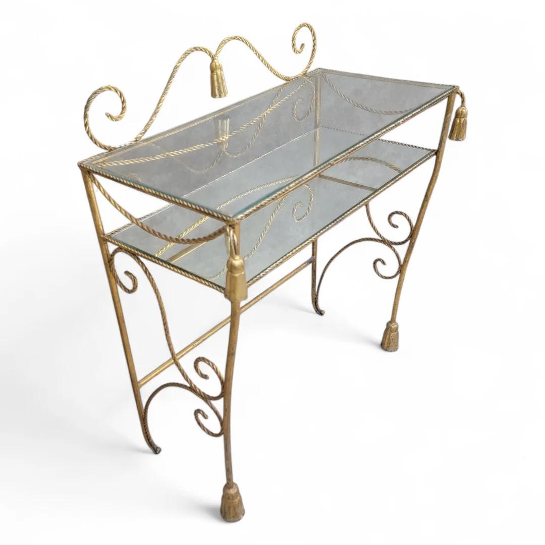 Antique Italian Two Tier Gilt Rope with Tassels Vanity/Dry-Bar Console Table 

This is a stunning addition to any elegant space.  The two-tier structure provides ample space for displaying decorative items or serving beverages, making it both