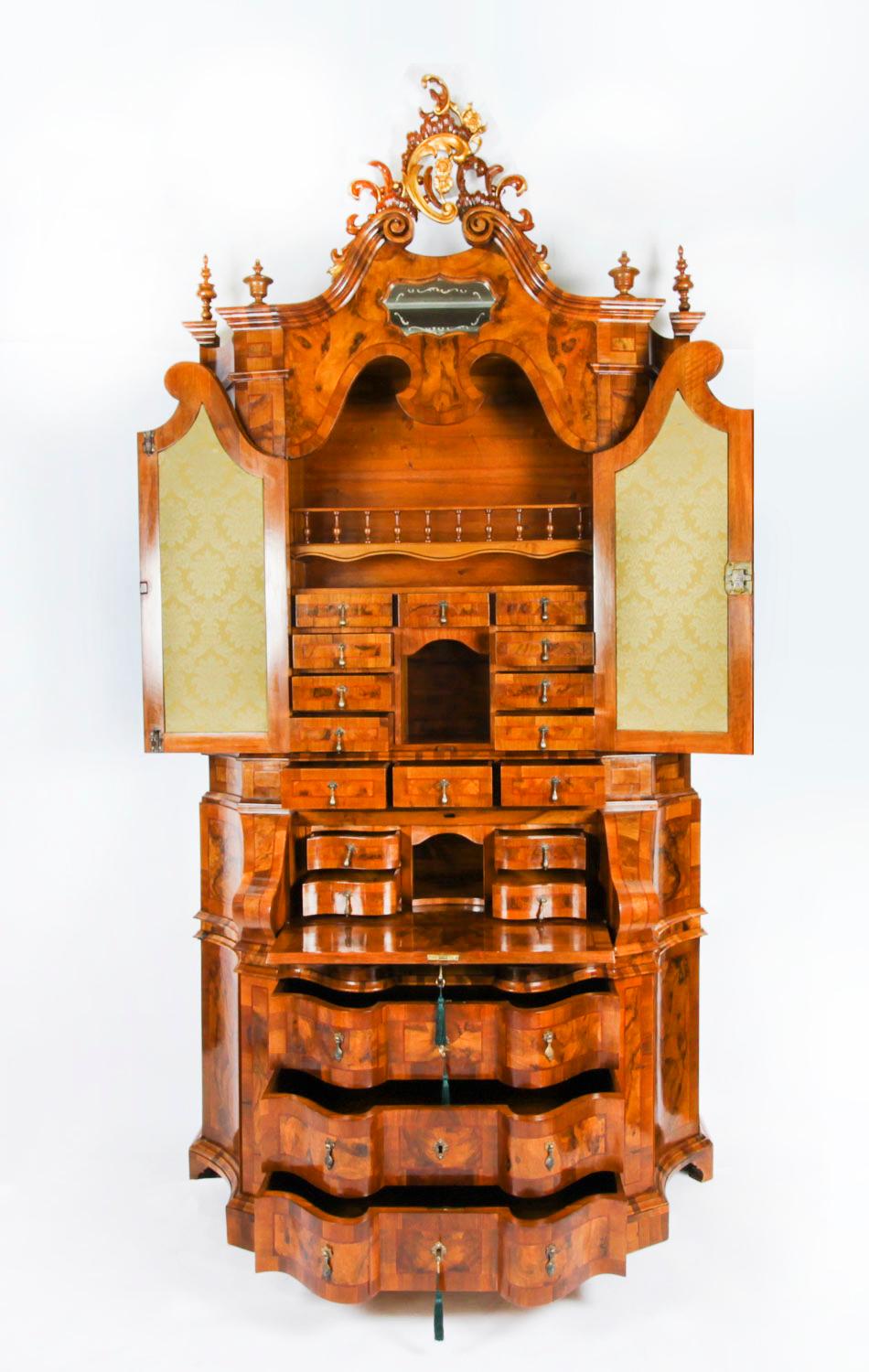 A monumental antique Venetian bureau bookcase, Circa 1880 in date.

It is a superb copy of an 18th Century Venetian bureau bookcase, the original  would be worth in the region of a million pounds. It is masterfully made from the finest burr walnut,