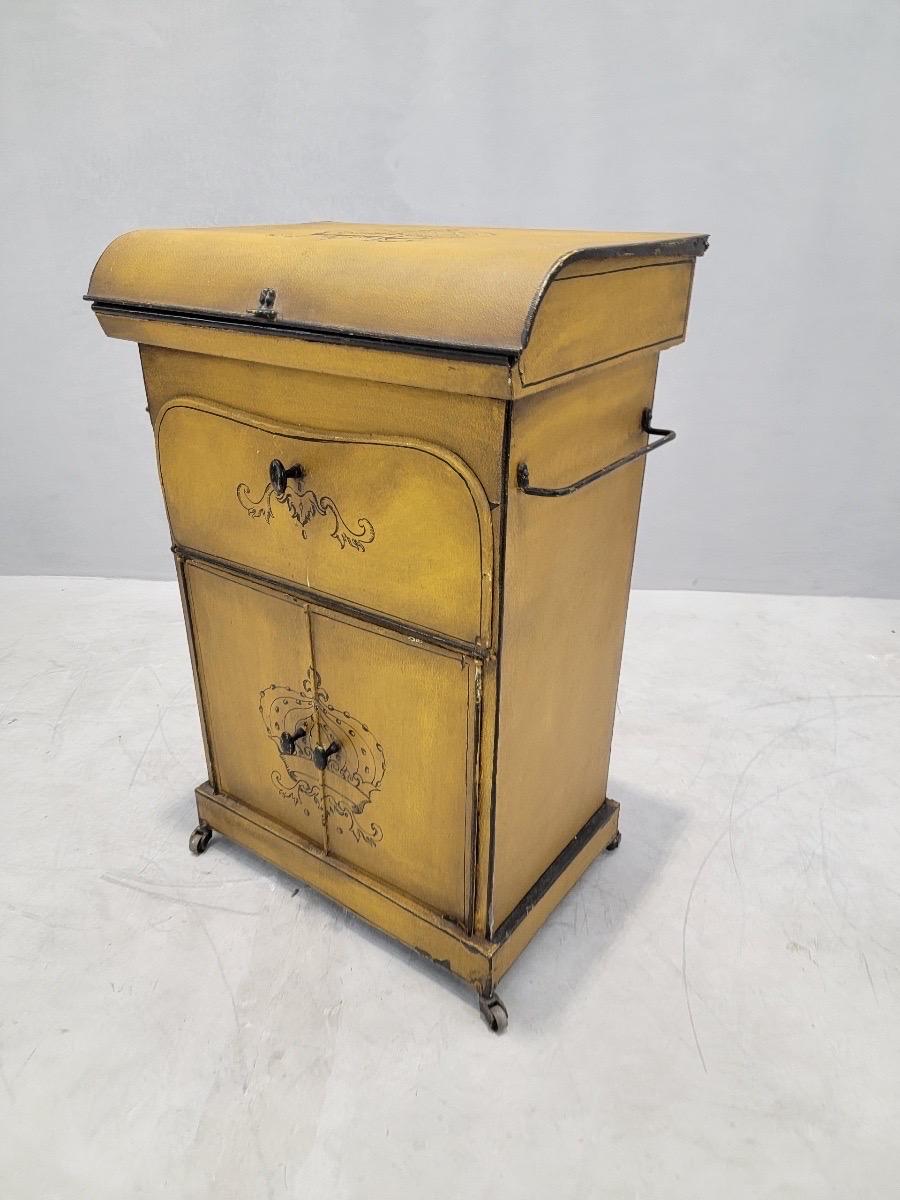 Antique Italian Yellow Metal Wash Stand 

Now featuring this 19th Century metal wash stand in yellow. The table top opens to reveal a mirror and small wash-basin. This discreet space is perfect for storing makeup, jewelry and other accessories. This