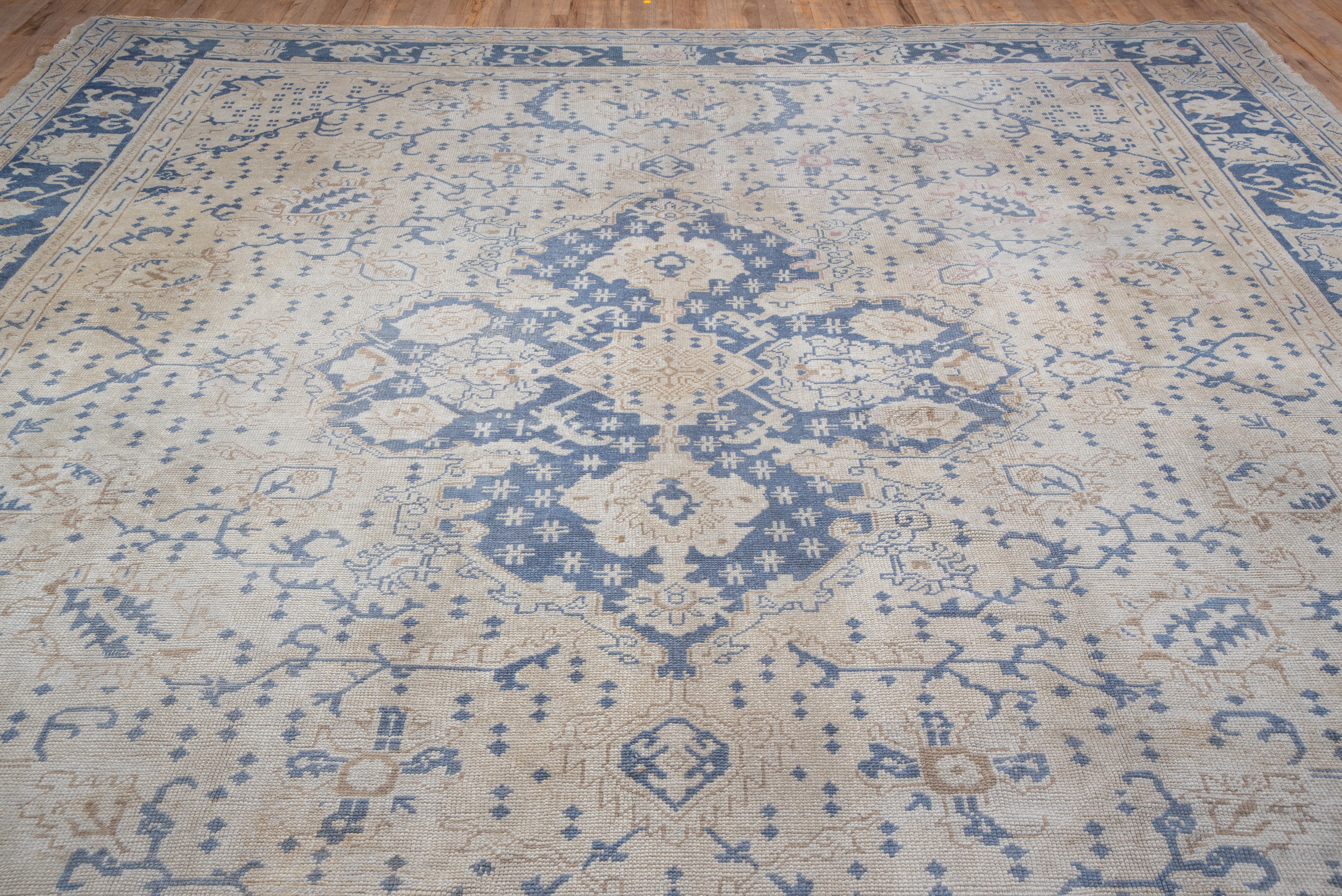 Hand-Knotted Antique Ivory & Blue Turkish Oushak Carpet, circa 1910s For Sale