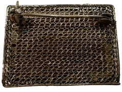 Carved Bone and Filigree Metal Brooch – Seated Man in Boat Scene