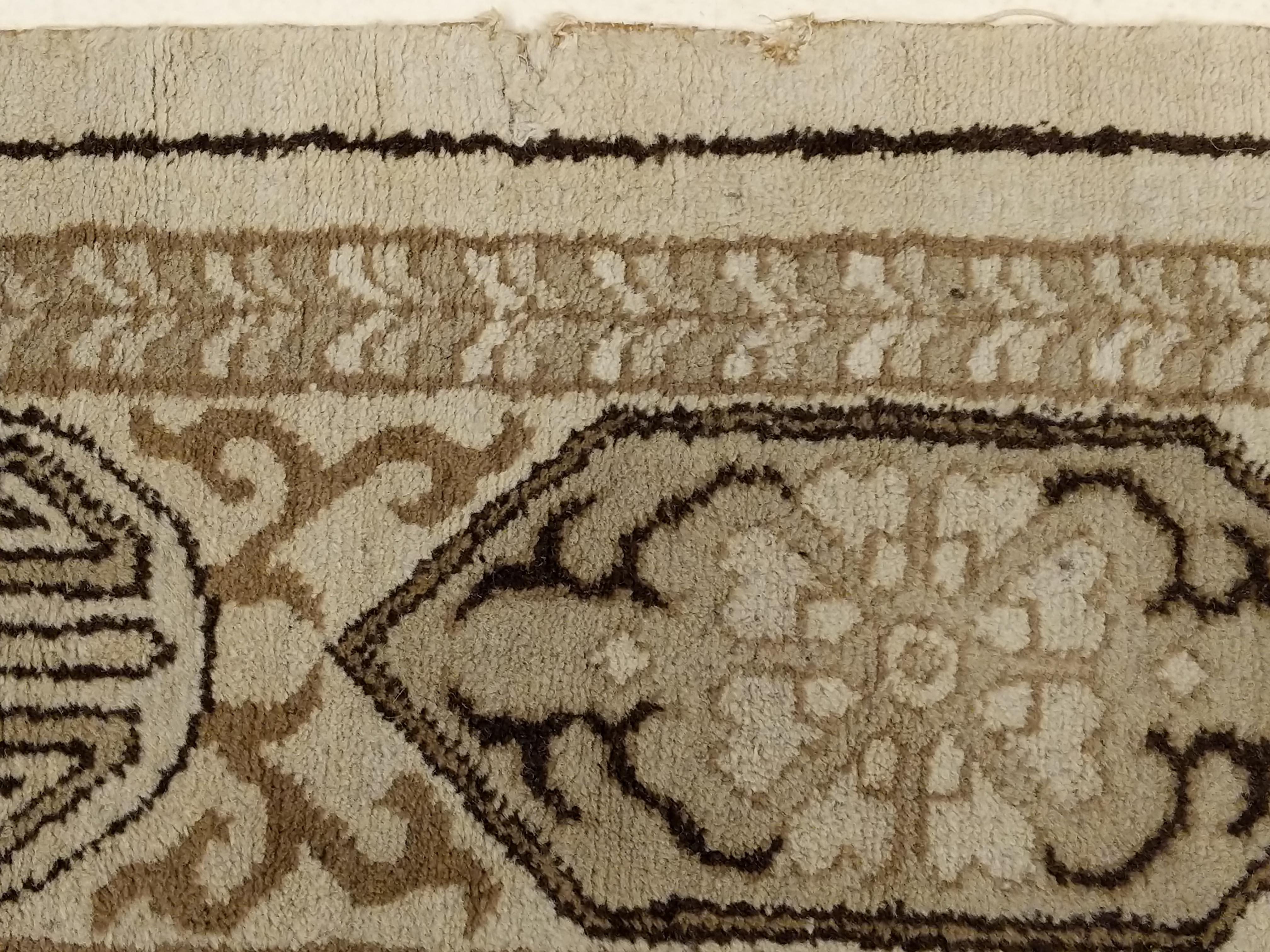 Wool Antique Ivory Indochine Rug with Stylised Pattern and Cartouche Border For Sale