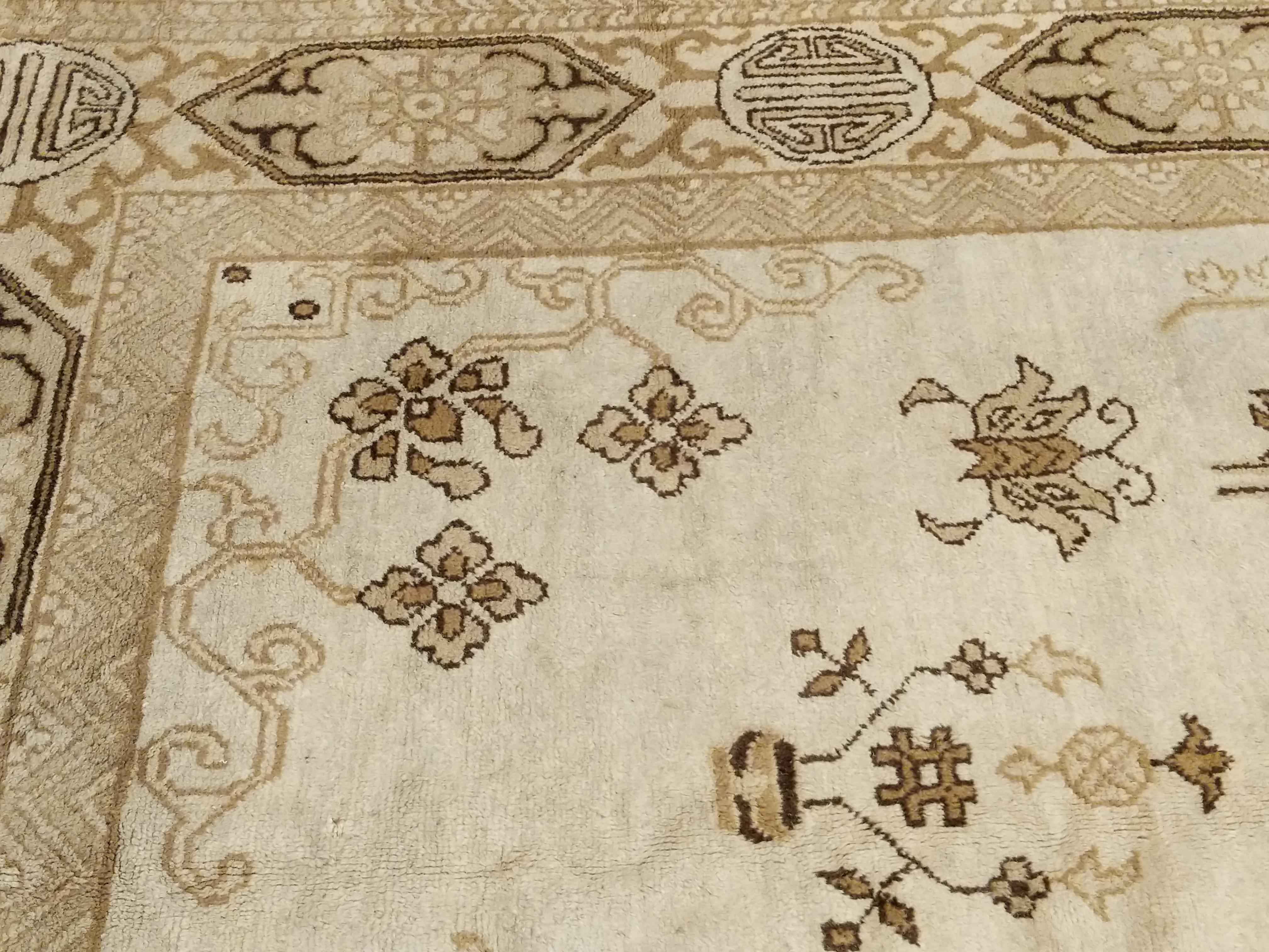 Hand-Knotted Antique Ivory Indochine Rug with Stylised Pattern and Cartouche Border For Sale