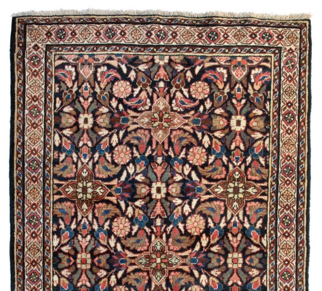 A Mashad rug uses cotton to form a base followed by a wool pile for a soft, cozy and durable texture. The Mashad rug typically has medallions and pendants woven throughout with ivory, red and blue as its commonly used colors.

This lovely antique