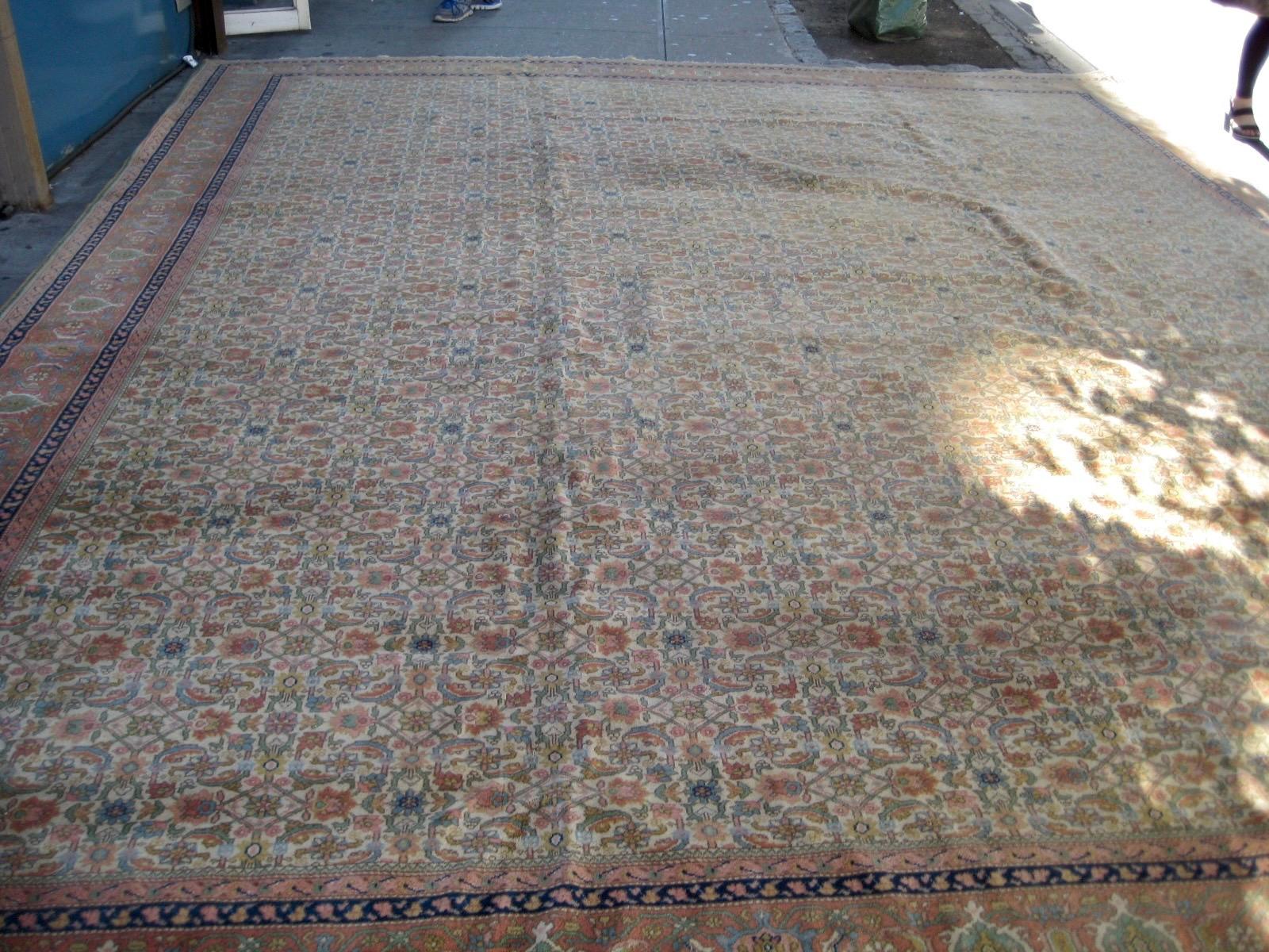 This lovely antique Agra carpet in excellent condition, measuring 12.9 x 15.7 ft and dates back to the 1880s.


 
