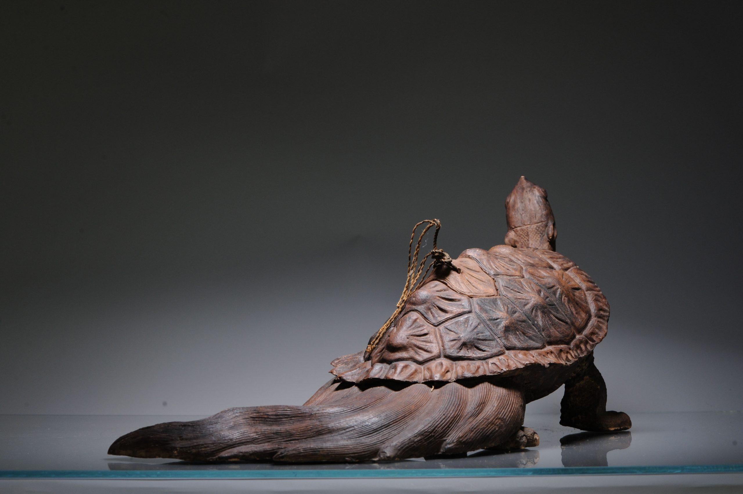 Description

Grand brûleur d'encens ou Okimono de tortue de belle facture. En faïence avec une belle patine. Préfecture de Shimane Iwayaki (Nagahama Yaki) Figurine de tortue. La tête et une partie du dos peuvent être enlevées.

Okimono (置物,