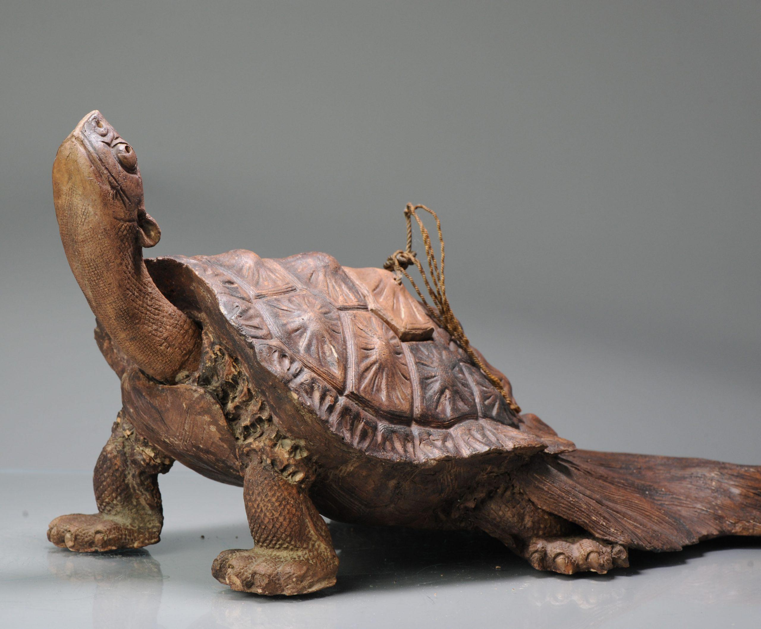 Nicely made and large incense burner or Okimono of a turtle. In earthenware with nice patina. Shimane Prefecture Iwayaki (Nagahama Yaki) Turtle figurine. The head and part of the back can be removed.

Okimono (??, oki-mono) is a Japanese term