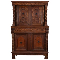 Antique Jacobean Heavily Carved Oak and Burl Step Back Cupboard, circa 1930