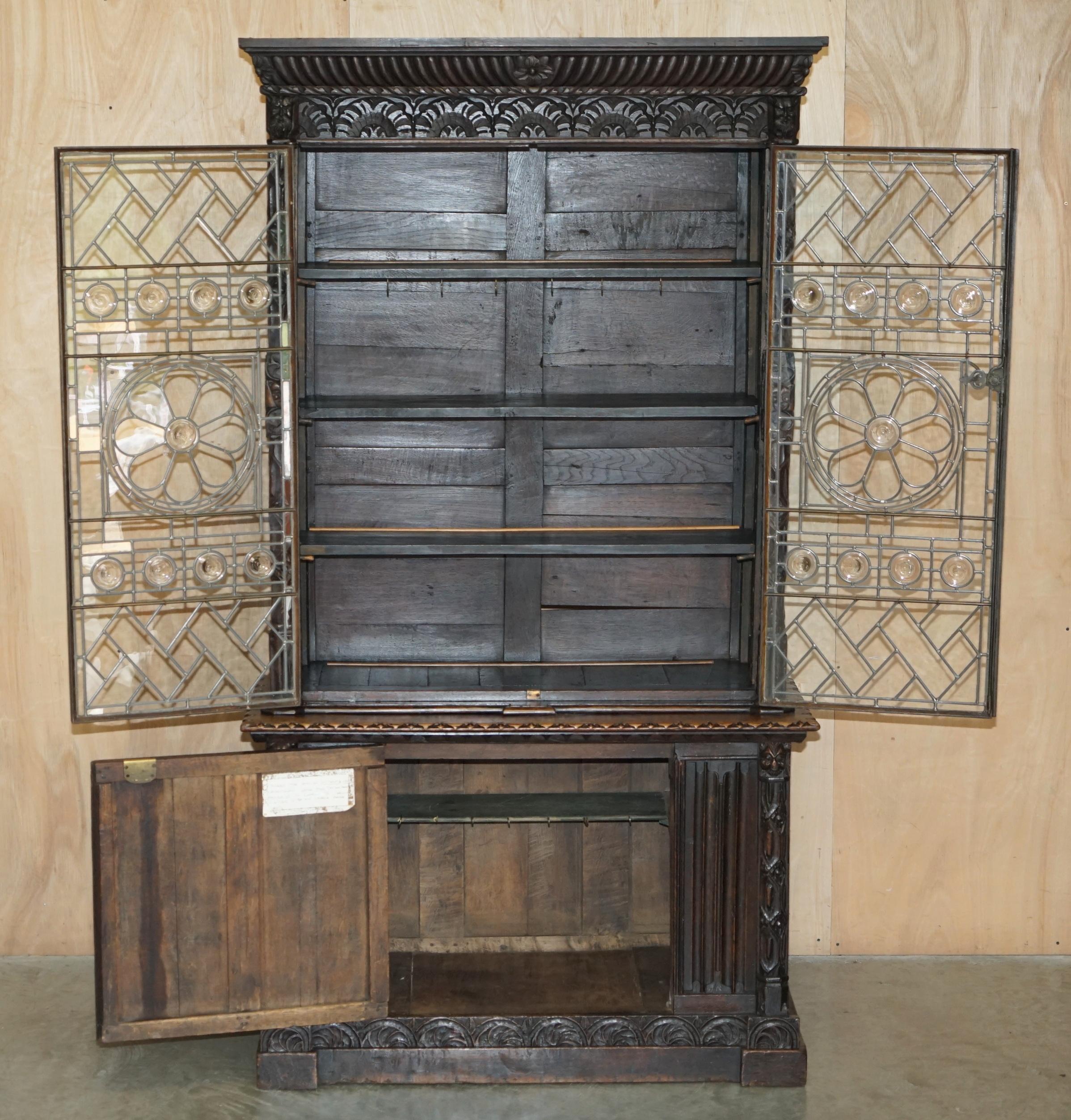 ANTiQUE JACOBEAN LINEN FOLD CARVED ZINC LINED ASTRAL GLAZED LIBRARY BOOKCASe For Sale 5