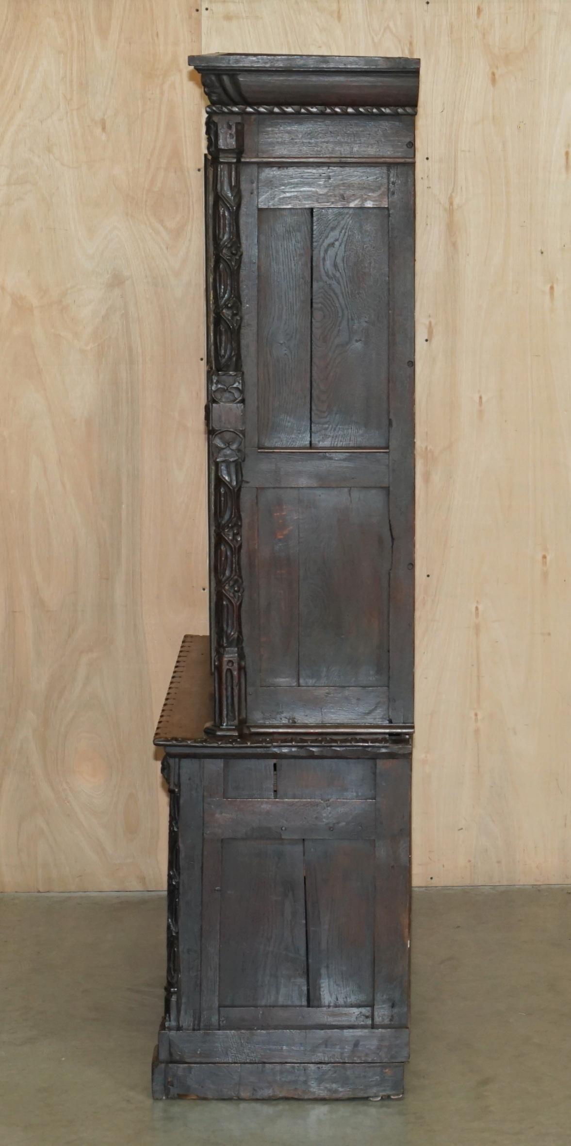 ANTiQUE JACOBEAN LINEN FOLD CARVED ZINC LINED ASTRAL GLAZED LIBRARY BOOKCASe For Sale 12