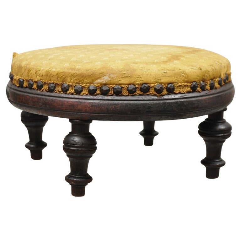 https://a.1stdibscdn.com/antique-jacobean-mahogany-round-small-footstool-ottoman-with-turn-carved-legs-for-sale/f_9341/f_347729721686767801361/f_34772972_1686767801909_bg_processed.jpg?width=768