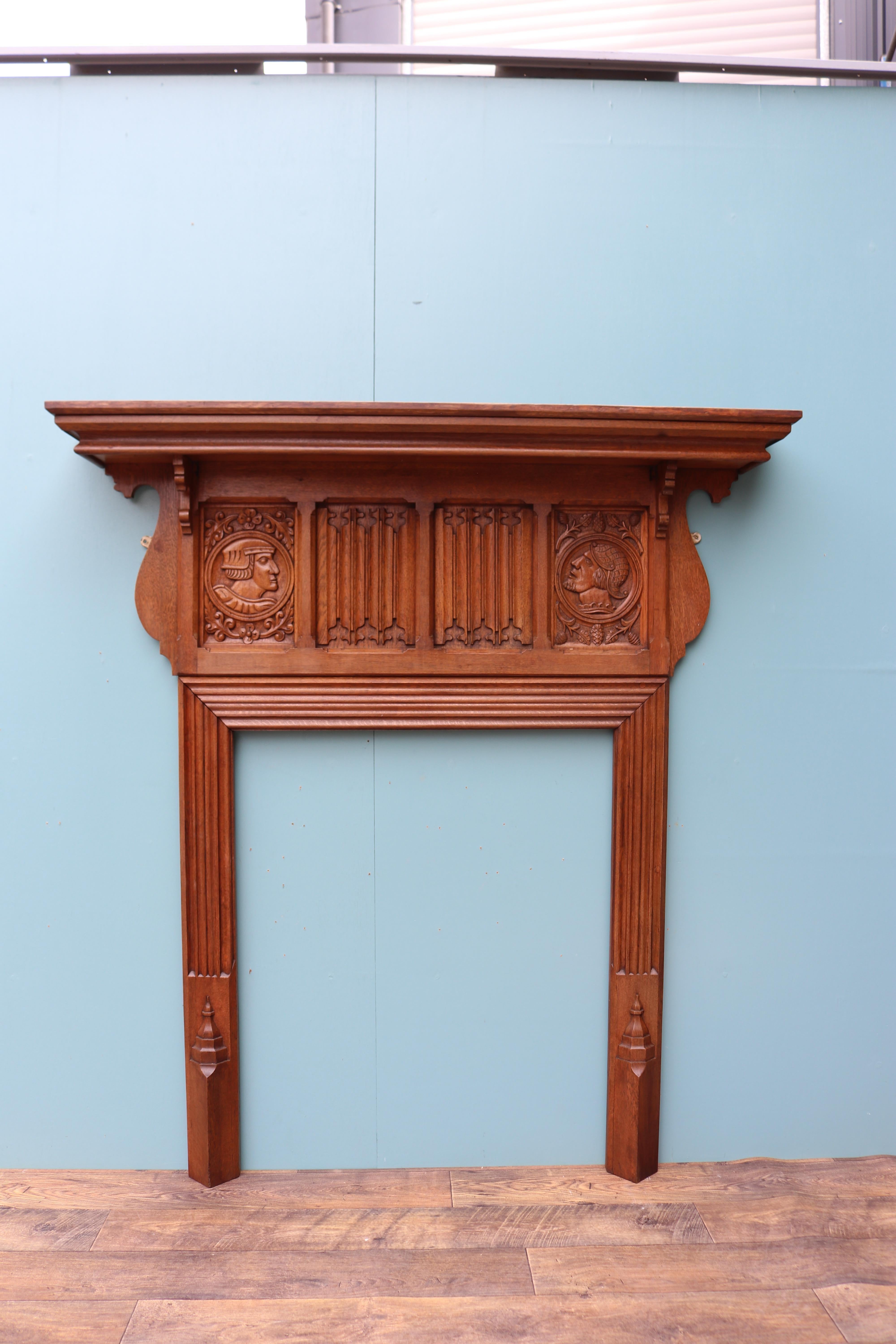 An English Jacobean style fire surround salvaged from a large country house near Petersfield, Hampshire. The frieze panel carved with heads and linen-fold panels.

Additional Dimensions

Opening Height 97.5 cm

Opening Width 80.5 cm

Width between