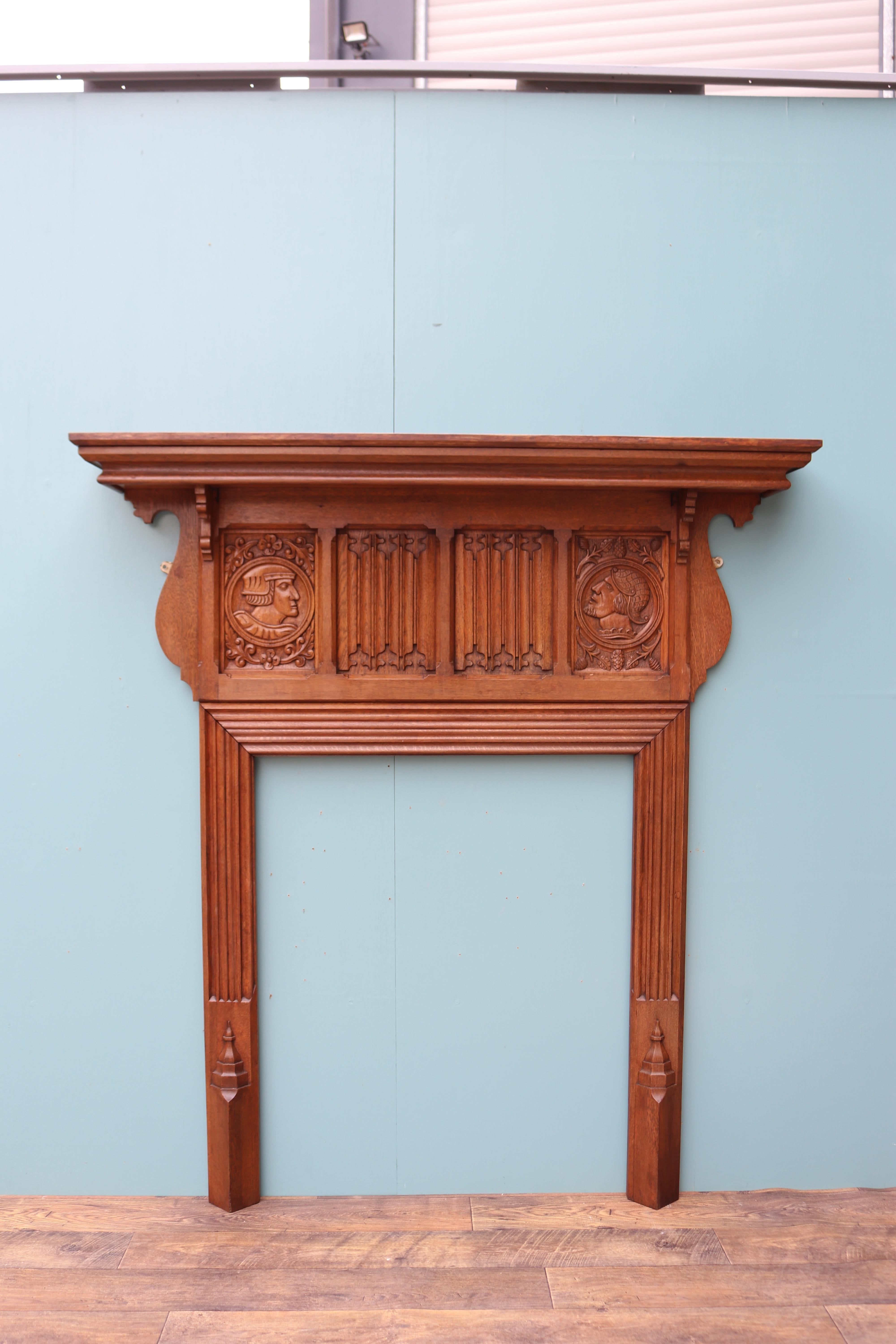 19th Century Antique Jacobean Revival Carved Oak Mantel For Sale