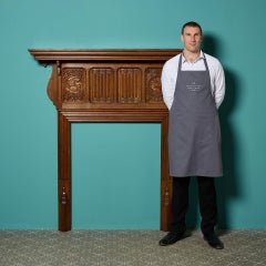 Antique Jacobean Revival Carved Oak Fireplace