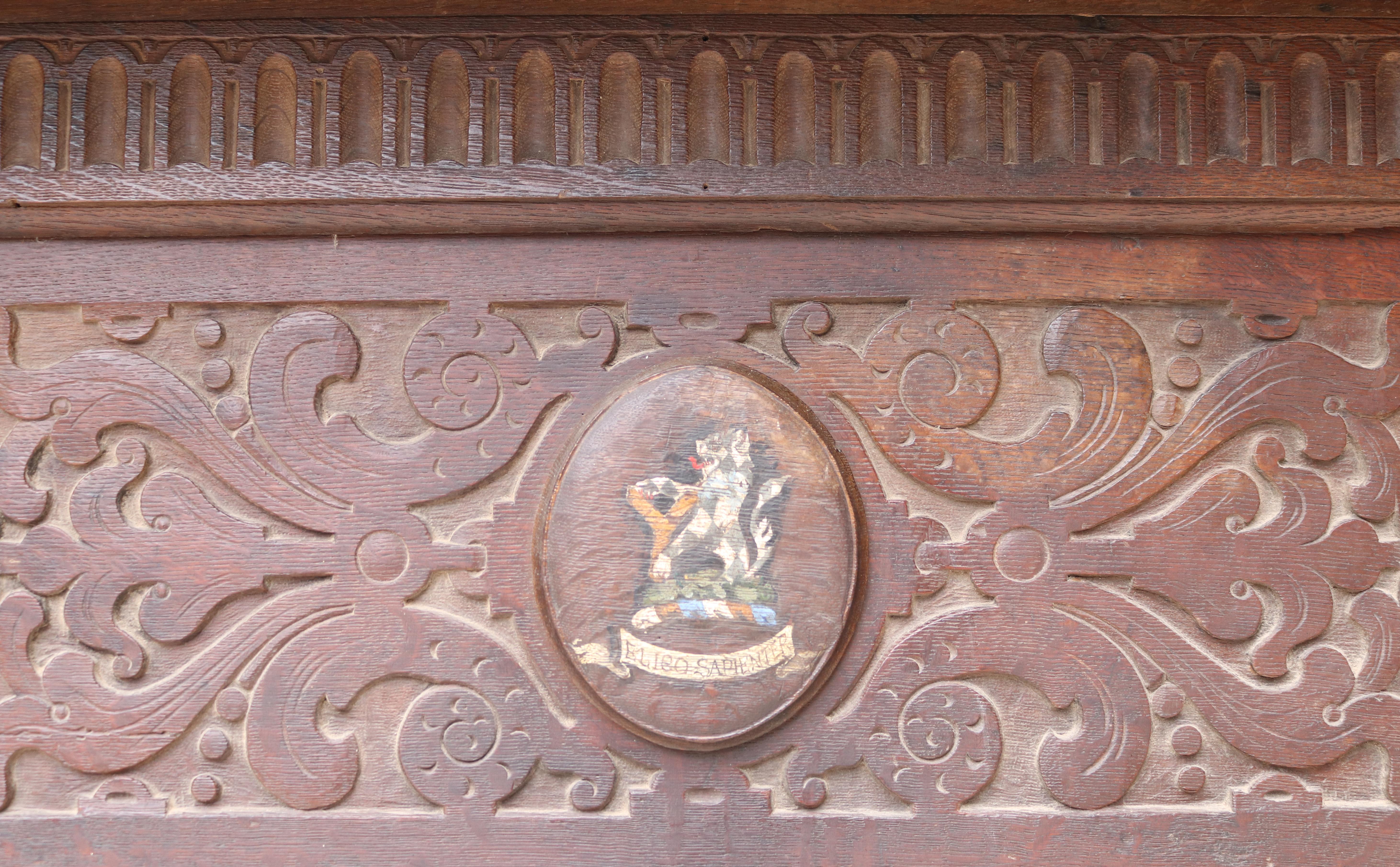 English An Antique Jacobean Style Carved Oak Fireplace For Sale