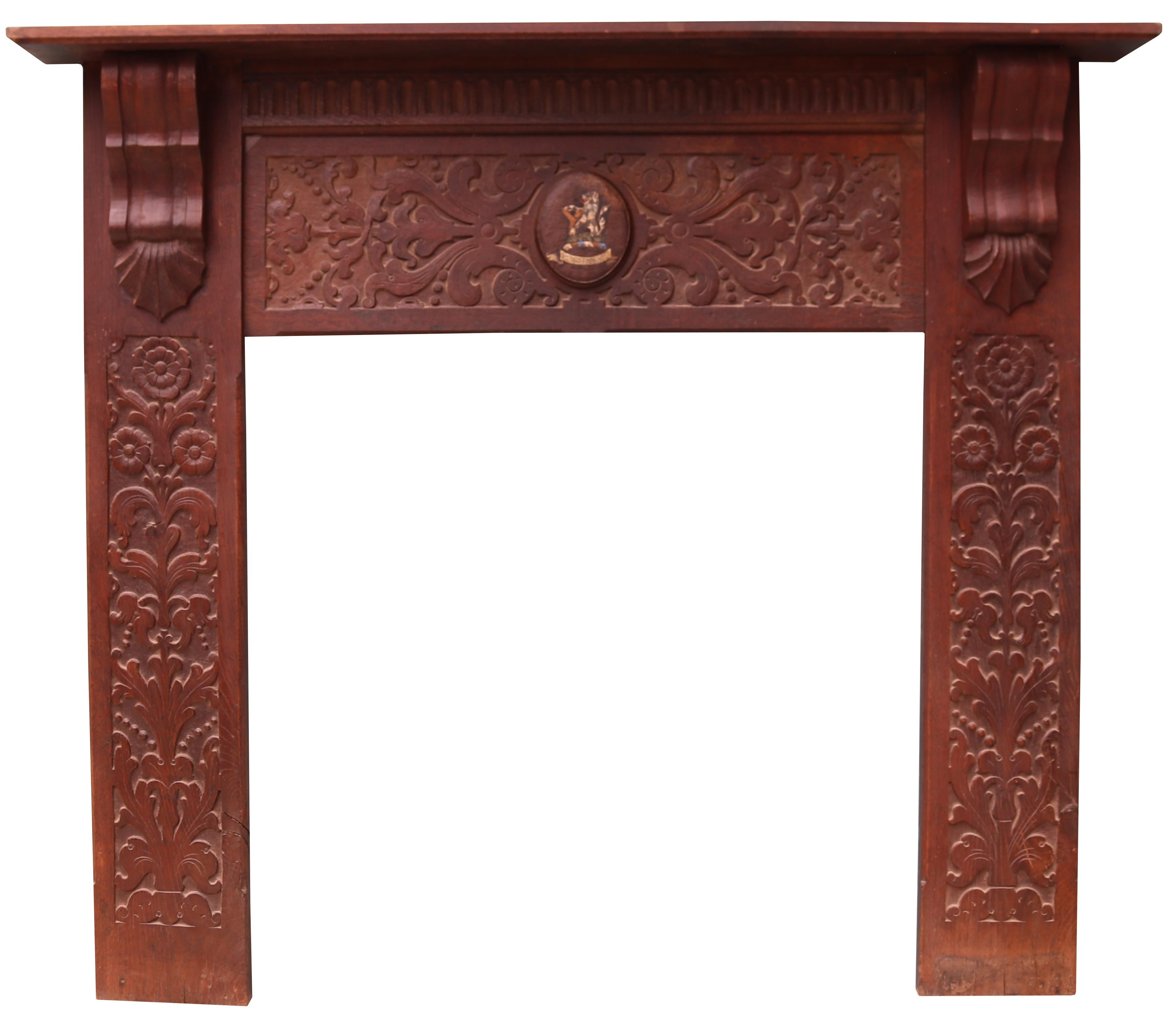 Hand-Crafted An Antique Jacobean Style Carved Oak Fireplace For Sale