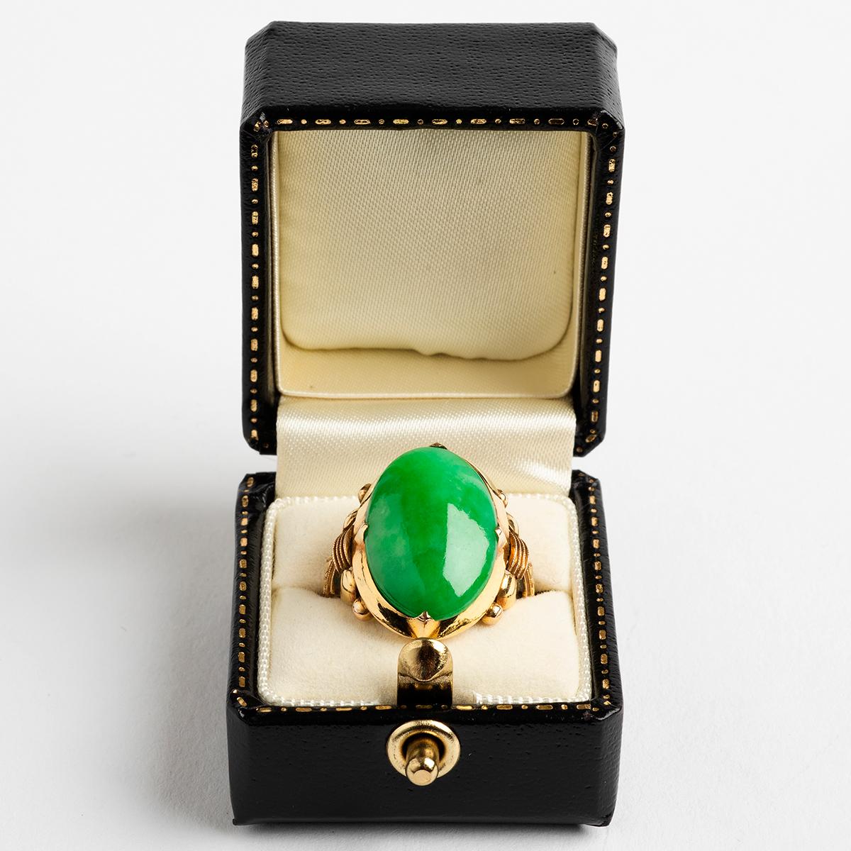 
Our antique jade ring with cabochon set features a 14k yellow gold band. A wonderful quality stone, this would make a superb addition to a collection, the ring size is K.

A unique piece within our carefully curated Vintage & Prestige fine