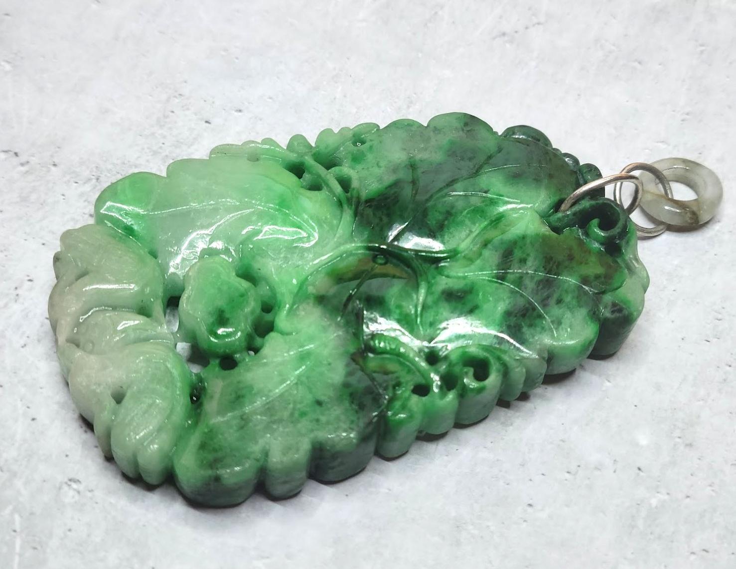 A very large hand-carved natural untreated Burmese jade pendant circa the late 18th to early 19th century Qing Dynasty. A very rare and unique size!

China directly controlled the Central Asian jade-yielding regions of Hotan and Yarkand between