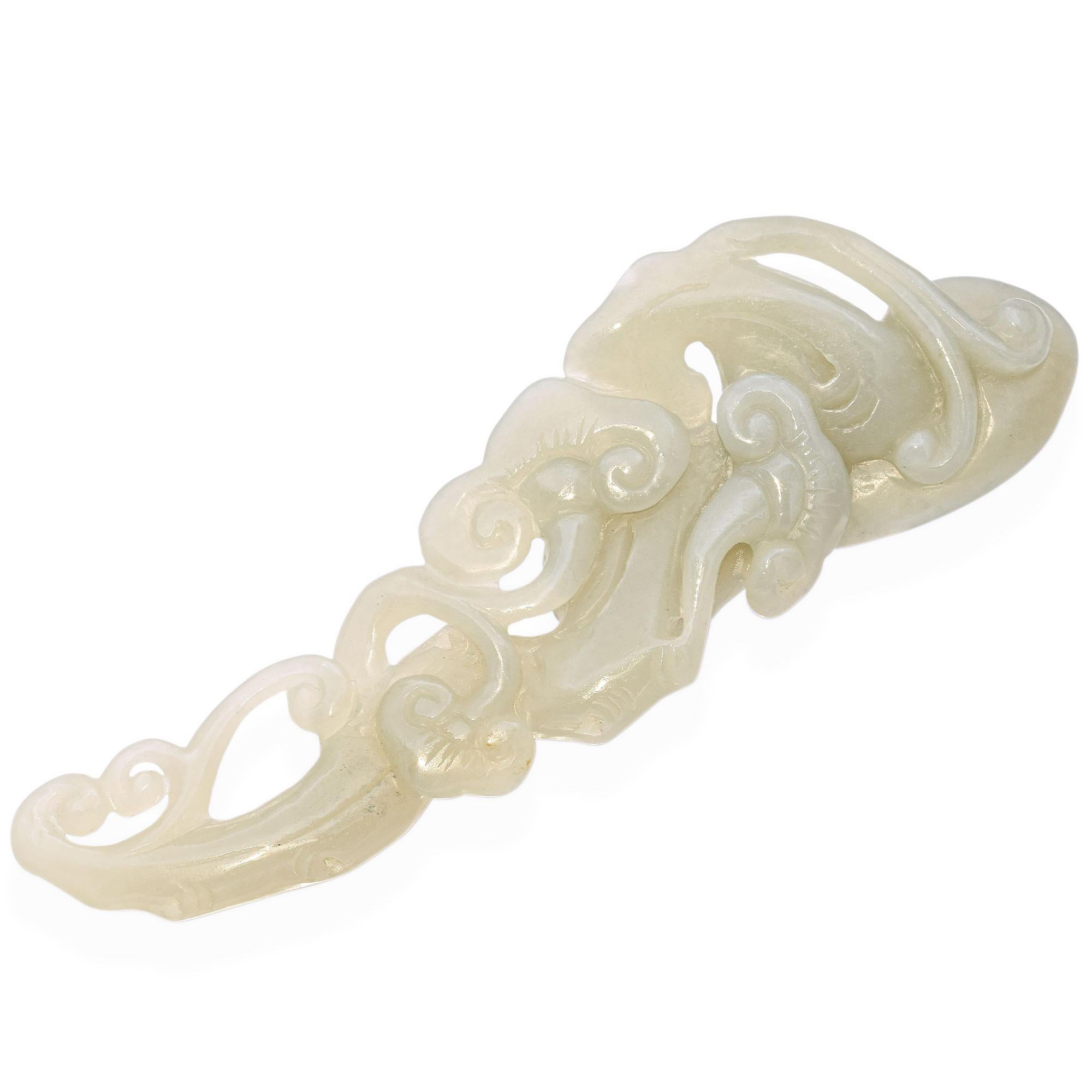 This antique jade carving features a gourd form intricately detailed with flowing vine motifs. The craftsmanship captures the natural curves and textures of the gourd and tendrils, symbolizing abundance and longevity in traditional culture. The
