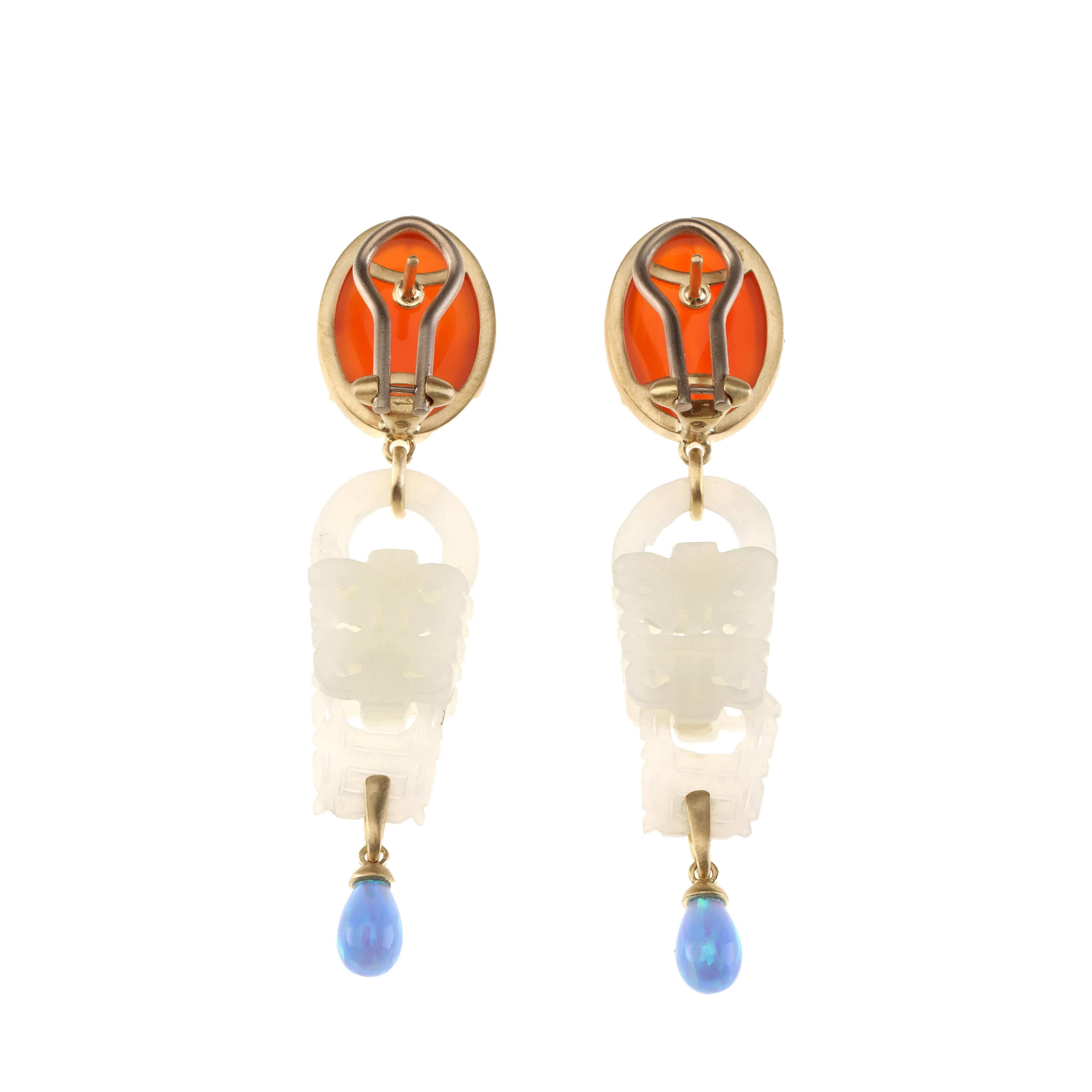 Antique imperial jade cine 1800 cabochon orange opal and drop in blu opal, ct total 9,60 18 k gold gr. 7,30.
All Giulia Colussi jewelry is new and has never been previously owned or worn. Each item will arrive at your door beautifully gift wrapped