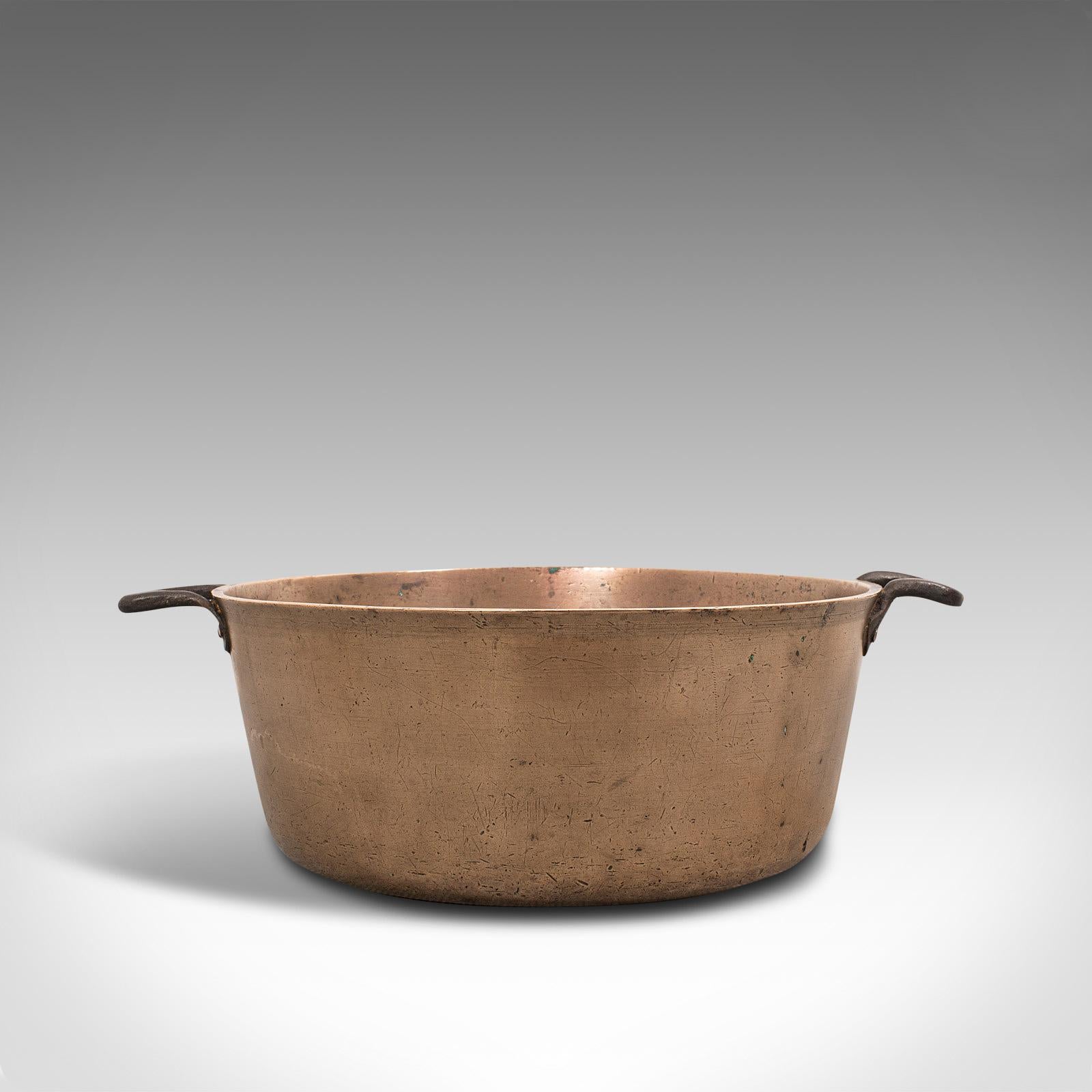 This is a superb antique jam pan. An English, heavy bronze preserves or cooking pot with iron handles, dating to the late 18th century, circa 1800.

Of superior weight and wonderfully aged
Displaying a desirable aged patina
Bronze shows