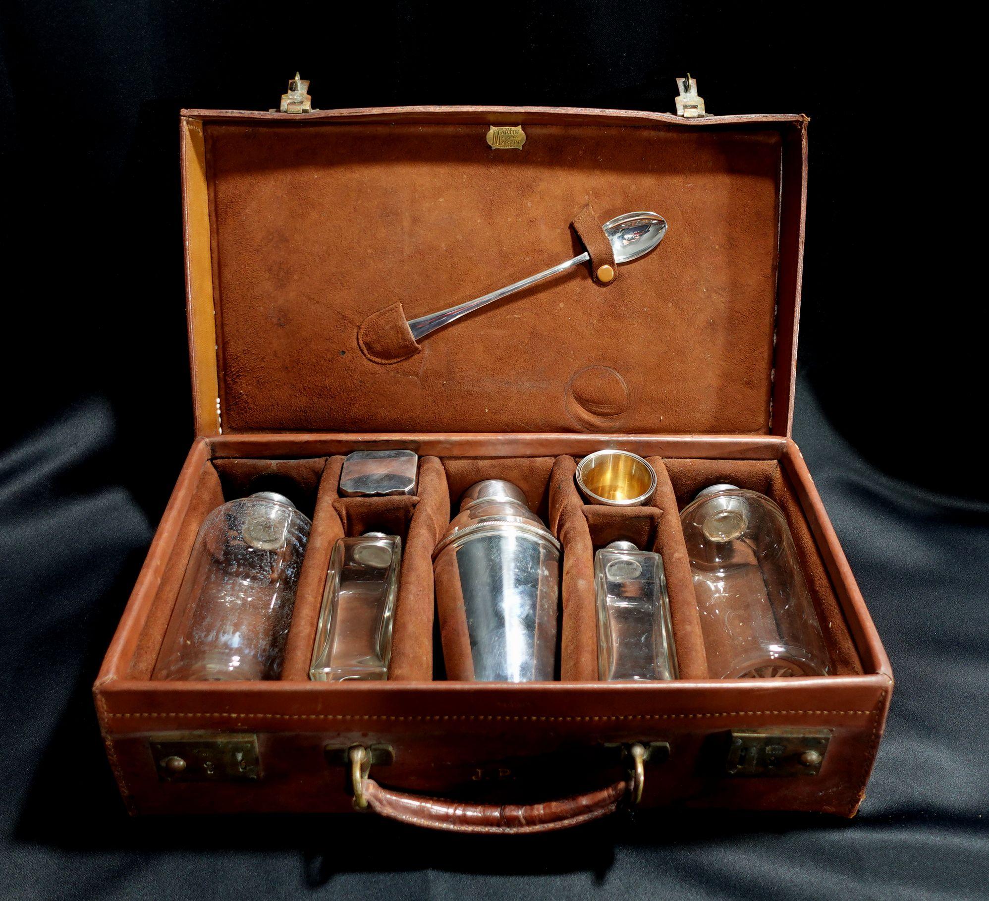 Antique James Dixon & Sons electroplated silver and glass liquor set with fitted travel case. Longest piece measures approx. 8 1/8