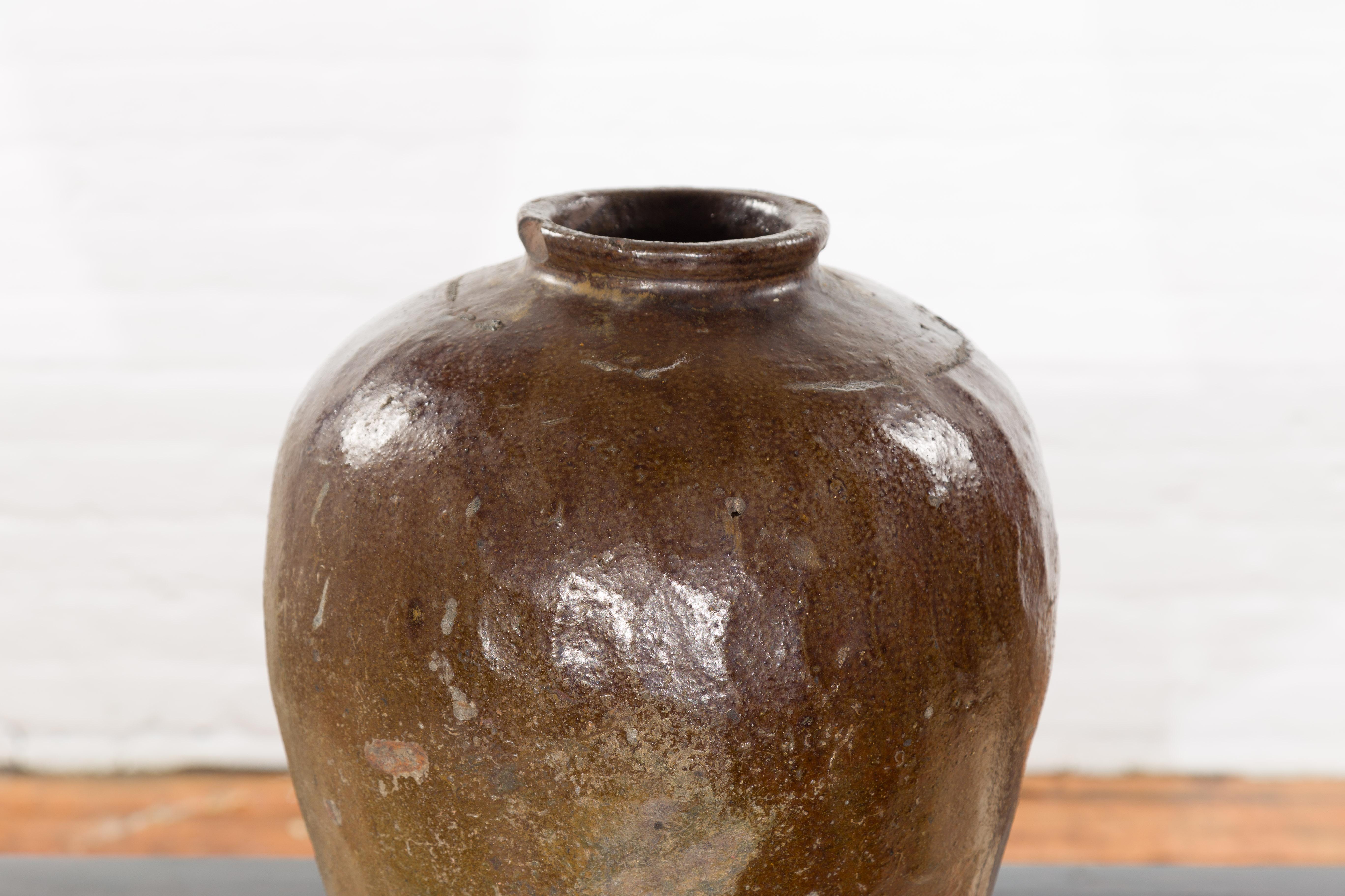 Ceramic Antique Japanese 19th Century Brown Glazed Water Jar with Distressed Appearance For Sale