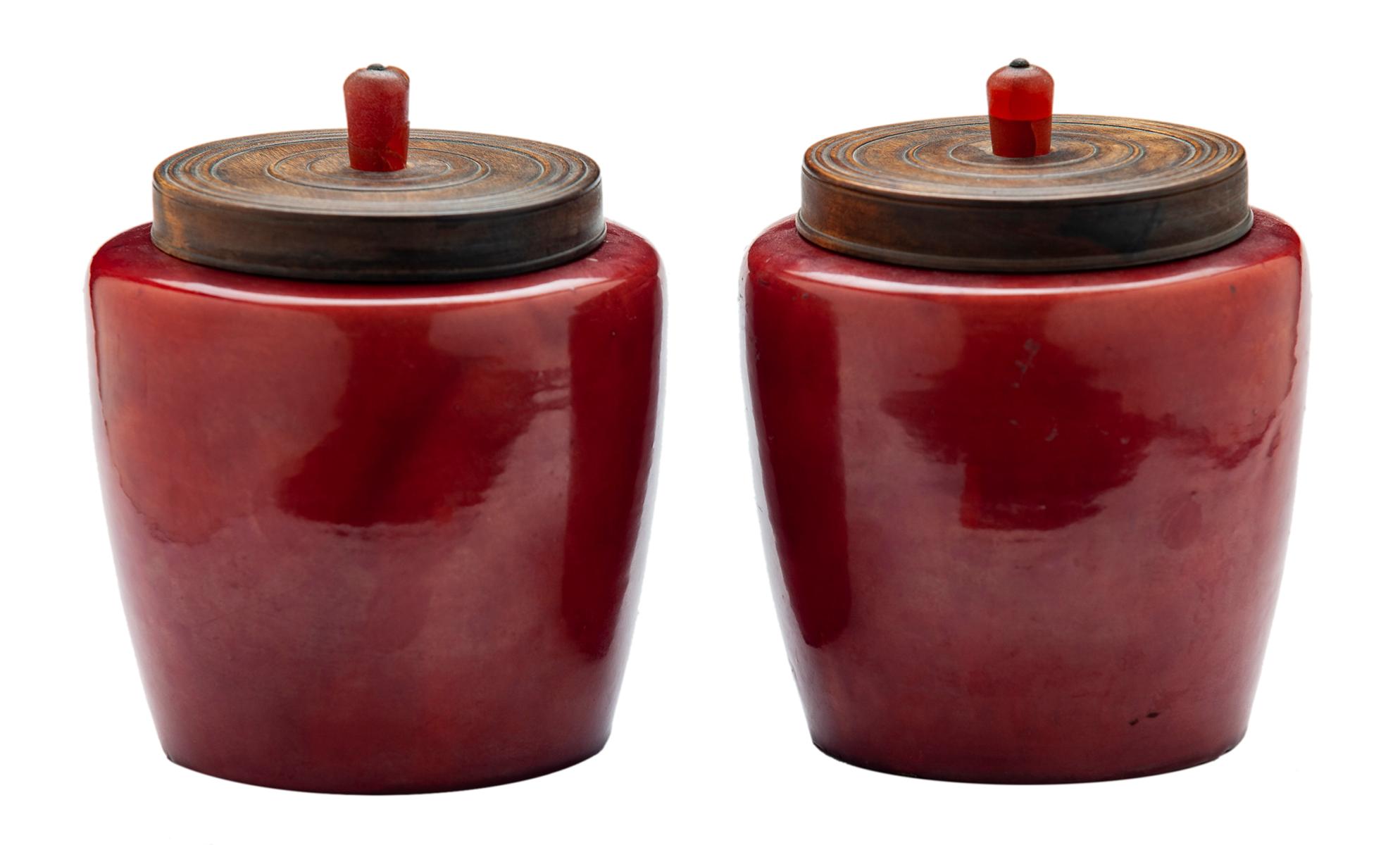 These antique Awaji jars have a deep burgundy color with a beautiful translucence created by such high temperatures during firing, that it borders on stoneware. The interior brush markings are the unique intention of the artist and are silvery in