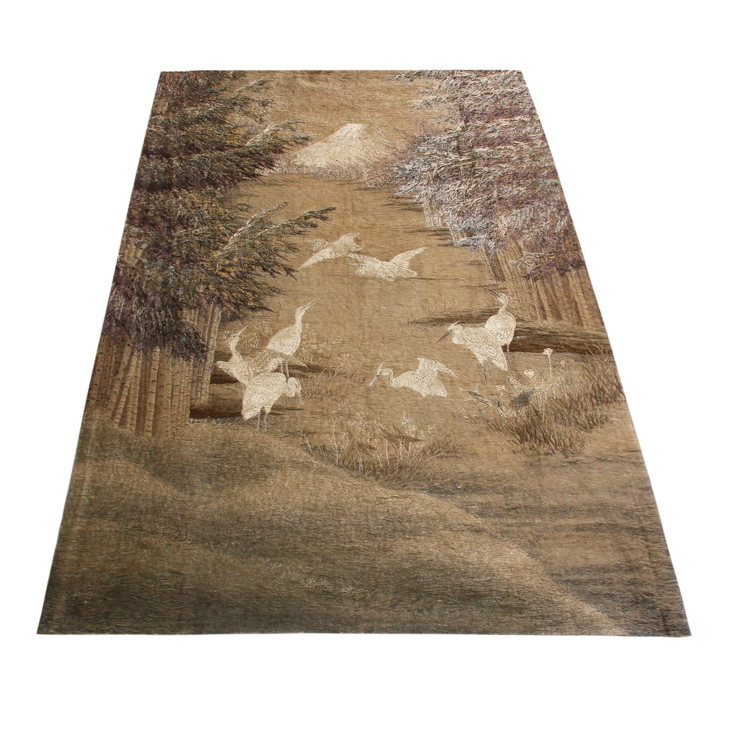 Hand knotted in high-quality, naturally lustrous silk, this antique Japanese tapestry from 1880 employs a serene setting with bold colorway choices, including the multicolor accents on the incredibly stylized crane and bamboo depictions in hues of