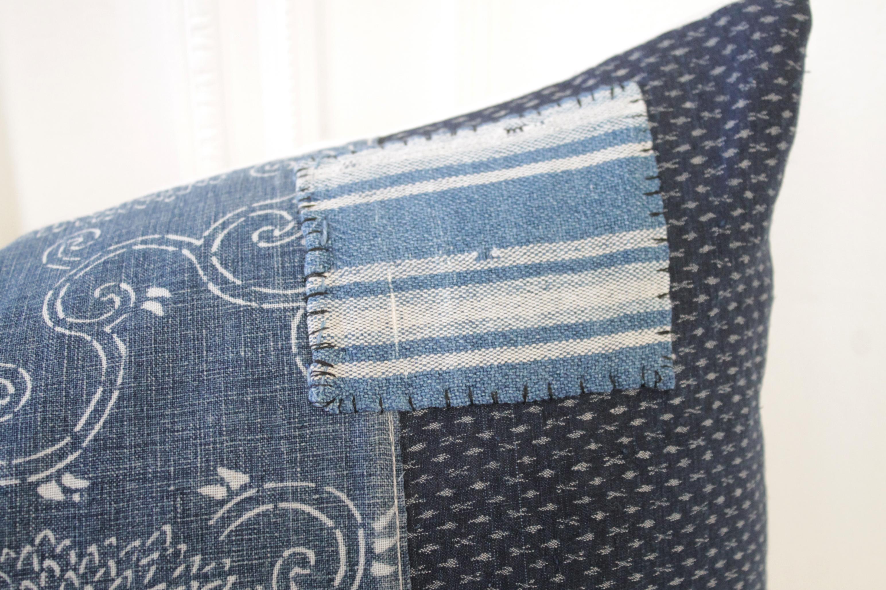 Antique Japanese Boro patchwork indigo lumbar pillow
Size: 14 x 20
Hidden zipper closure, face is lined. Dry cleaning recommended
Custom designed in our studio with antique pieces of indigo blue boro fabric, this patchwork pillow would make a
