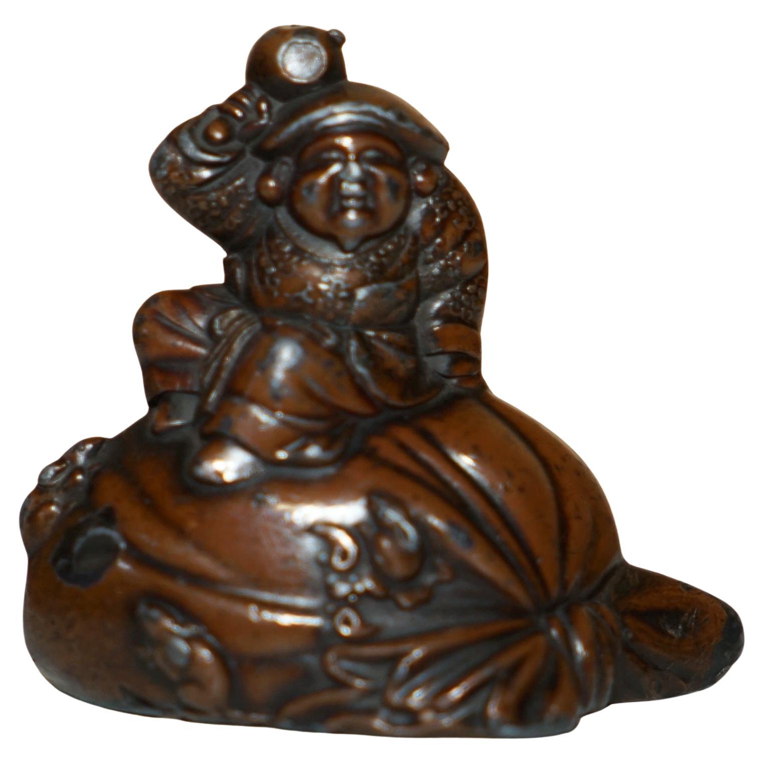 ANTIQUE JAPANESE BRONZE BUDDHA STATUE OF HIM SiTTING ON A SACK POURING WATER