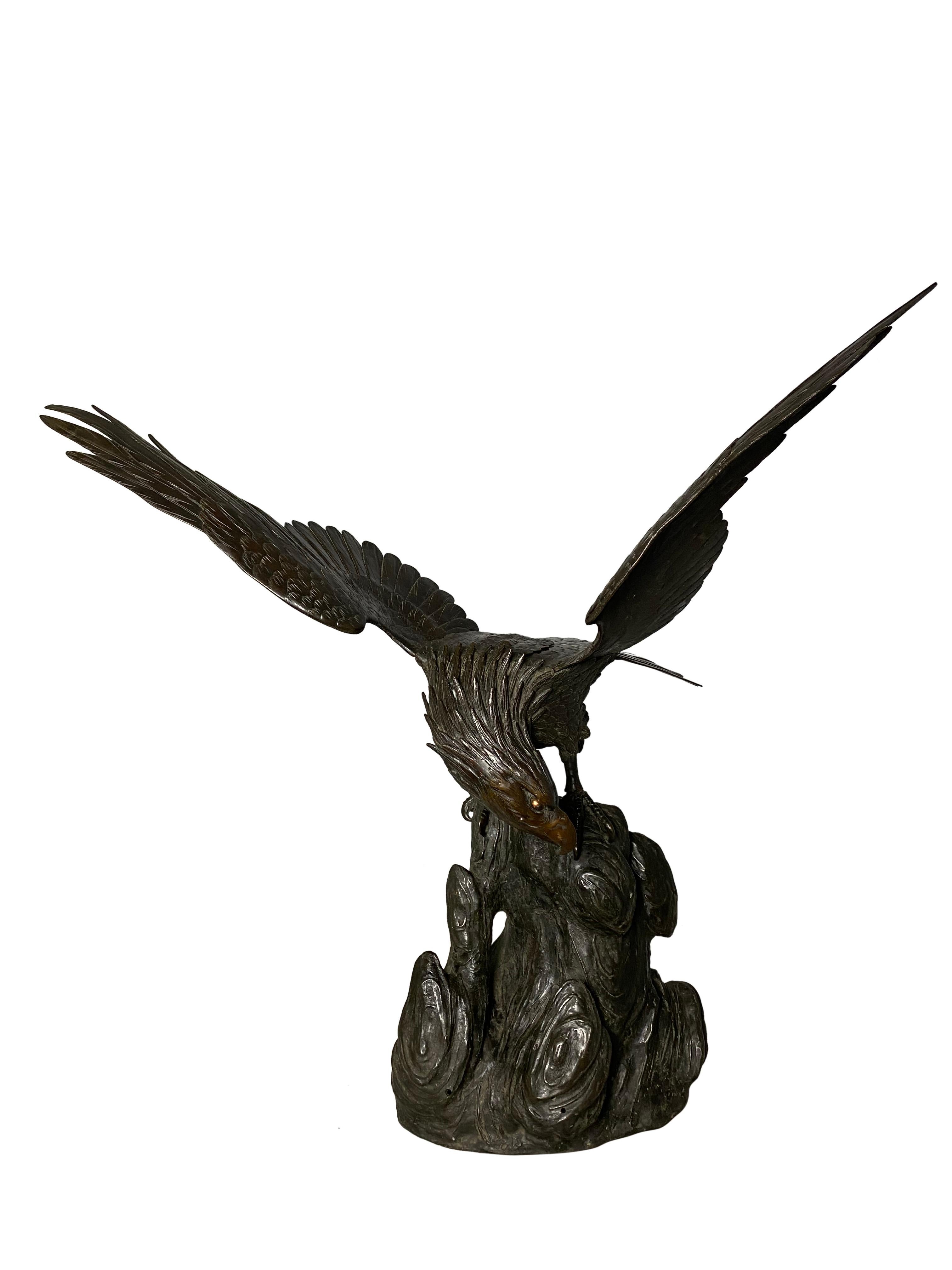 With extended wings, this cast bronze eagle statue has a regal and powerful stance, symbolic of freedom and power. The eagle is further supported by a stable base to be displayed in a handsome room as a showcase piece. 

Dimensions (cm)
H 100,