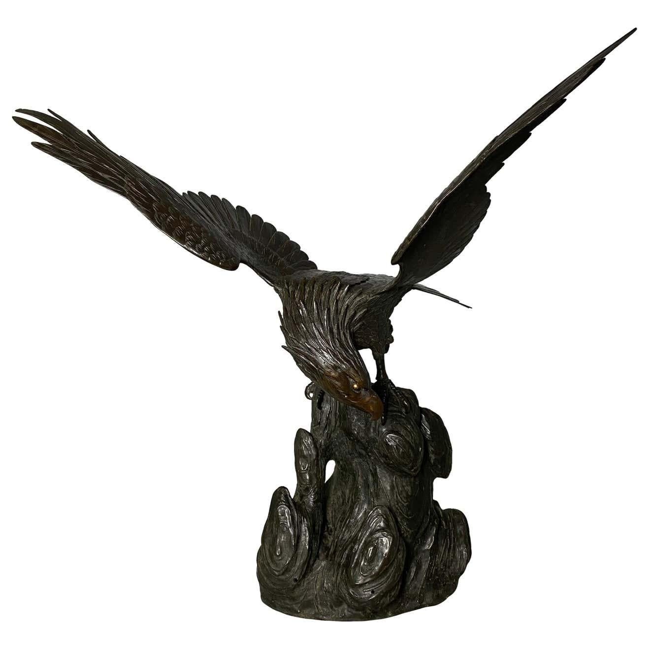 With extended wings, this cast bronze eagle statue has a regal and powerful stance, symbolic of freedom and power. The eagle is further supported by a stable base to be displayed in a handsome room as a showcase piece.

Dimensions (cm) H 100,