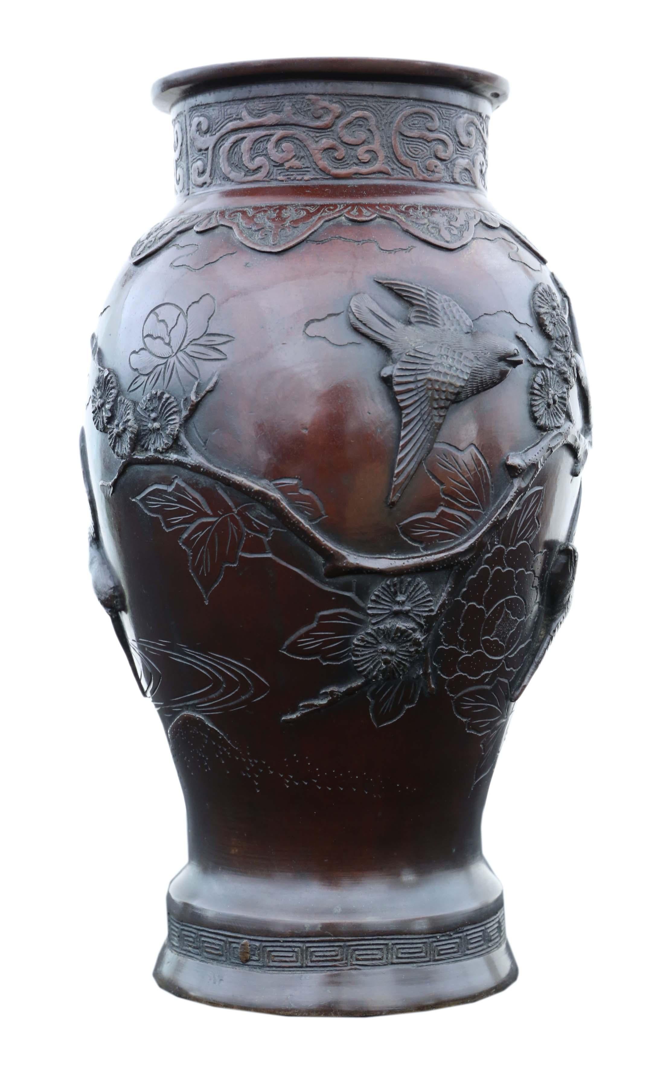 Japanese Meiji period bronze vase. Base has makers mark / signature.
Would look amazing in the right location. The very best color and patina. Exudes quality.
Overall maximum dimensions: ~31cm high x 19cm diameter (inner mouth 10cm diameter).