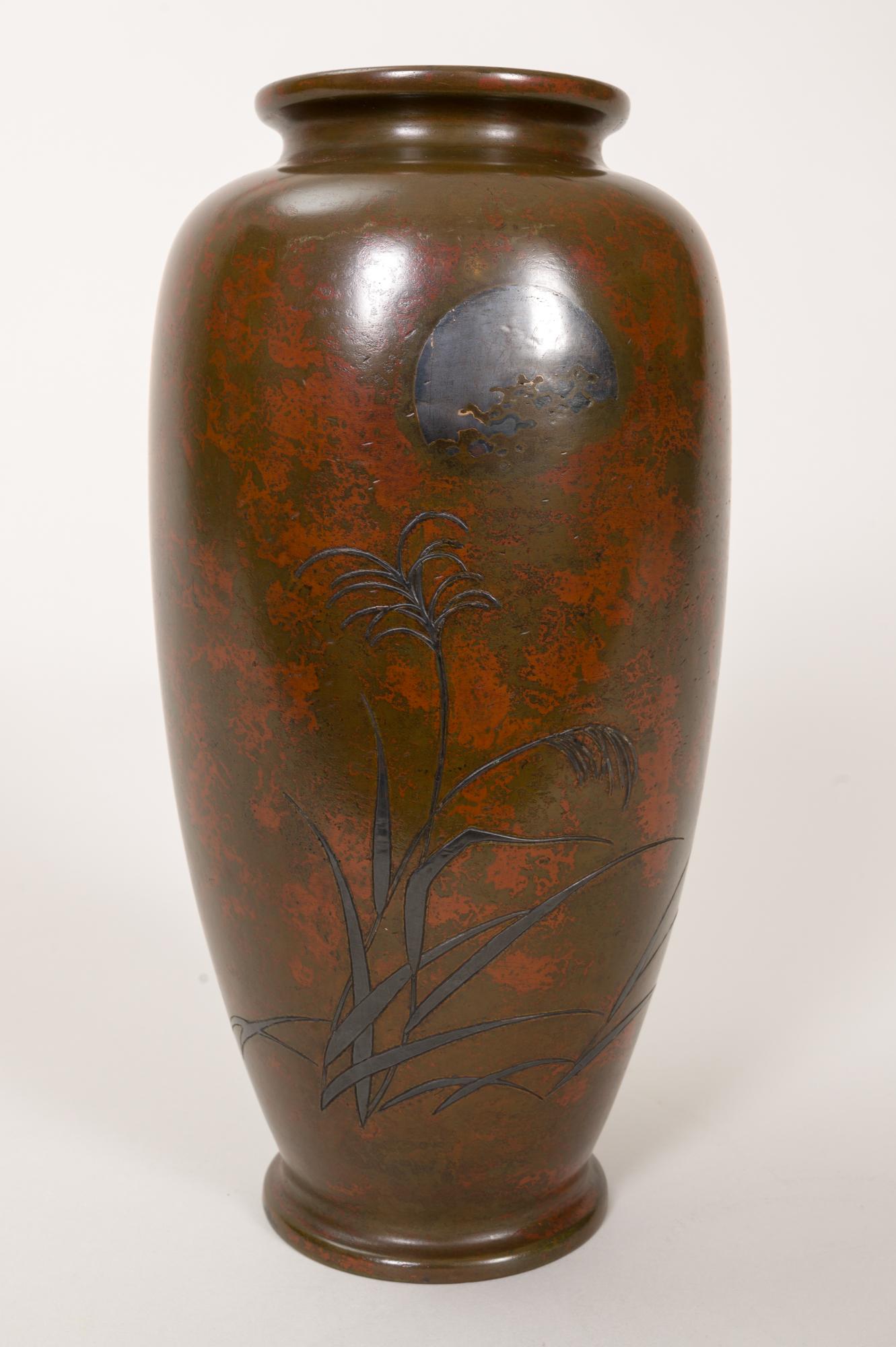 small bronze vase