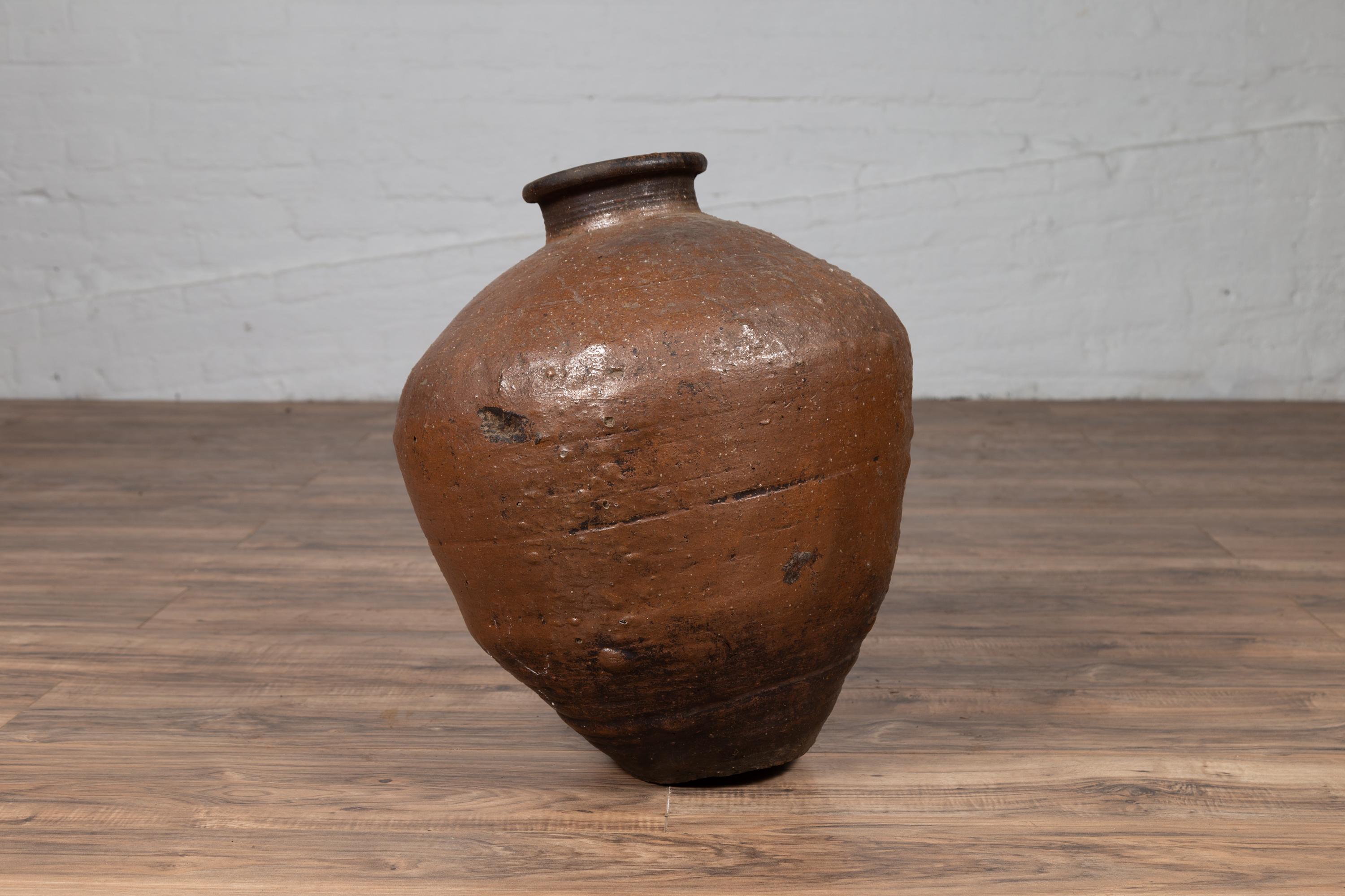 Antique Japanese Brown Oil Jar with Weathered Appearance and Irregular Shape For Sale 2