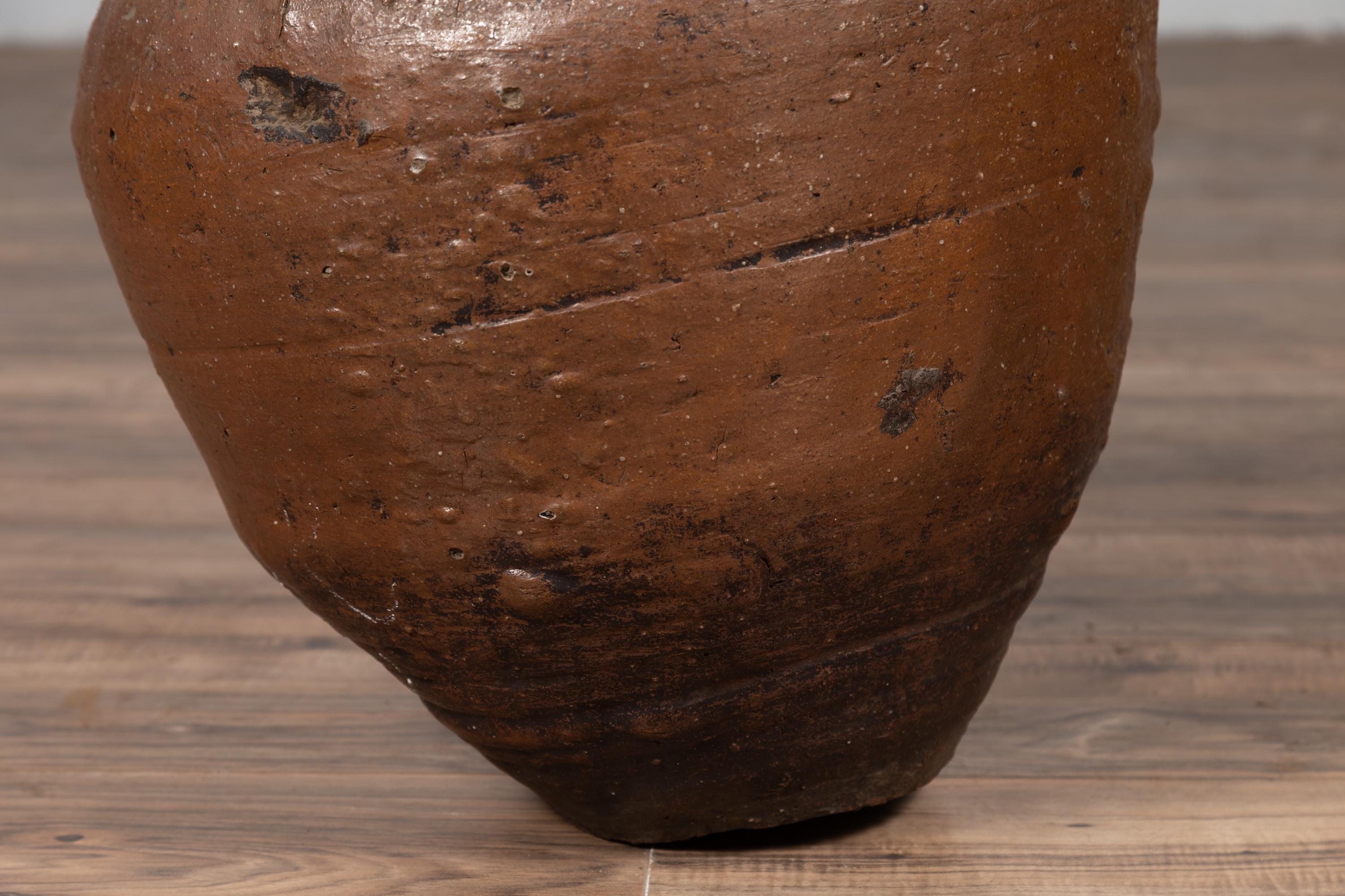 Antique Japanese Brown Oil Jar with Weathered Appearance and Irregular Shape For Sale 3