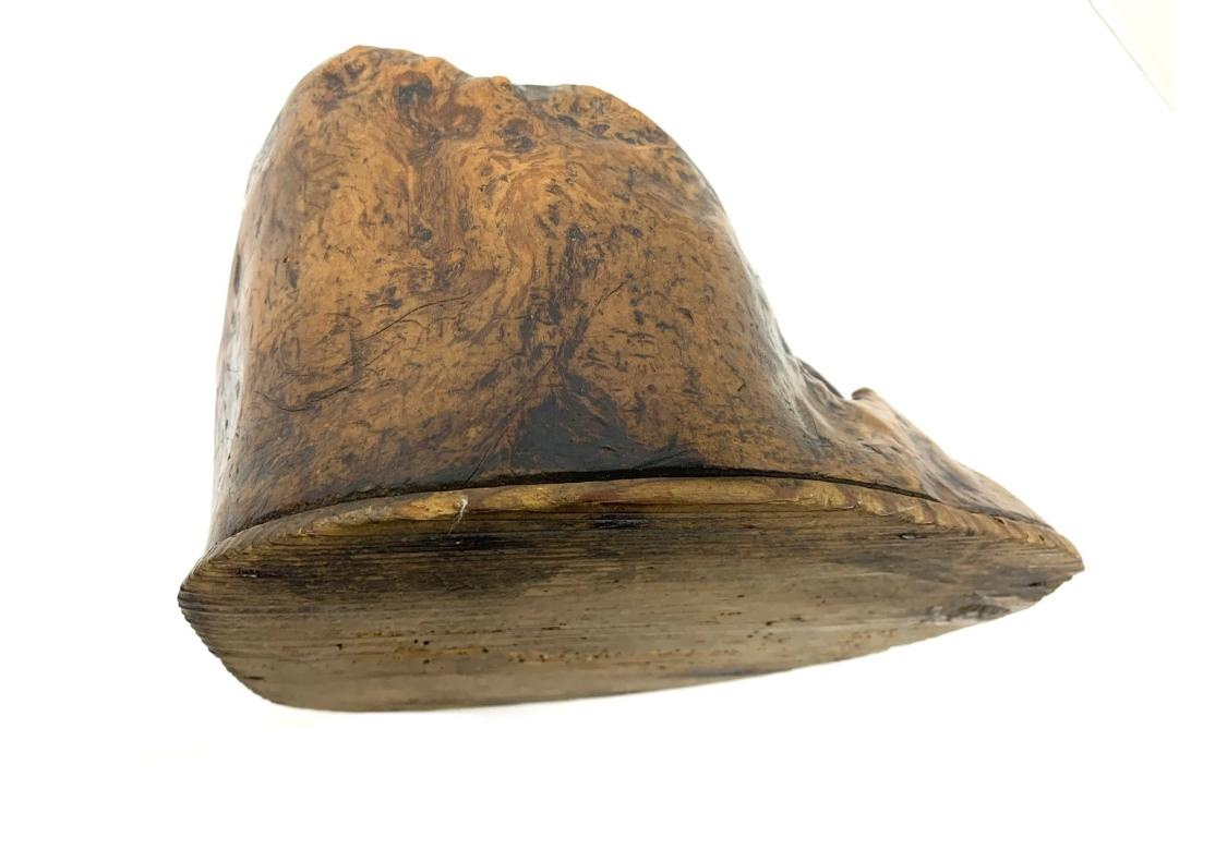 A antique Japanese scholar’s object made out of a solid burl wood trunk section having an added bottom with beautiful surface texture and dark Honey mottled patina. Originally designed to hold smoking implements of traditional ‘Tabako bon’ set: