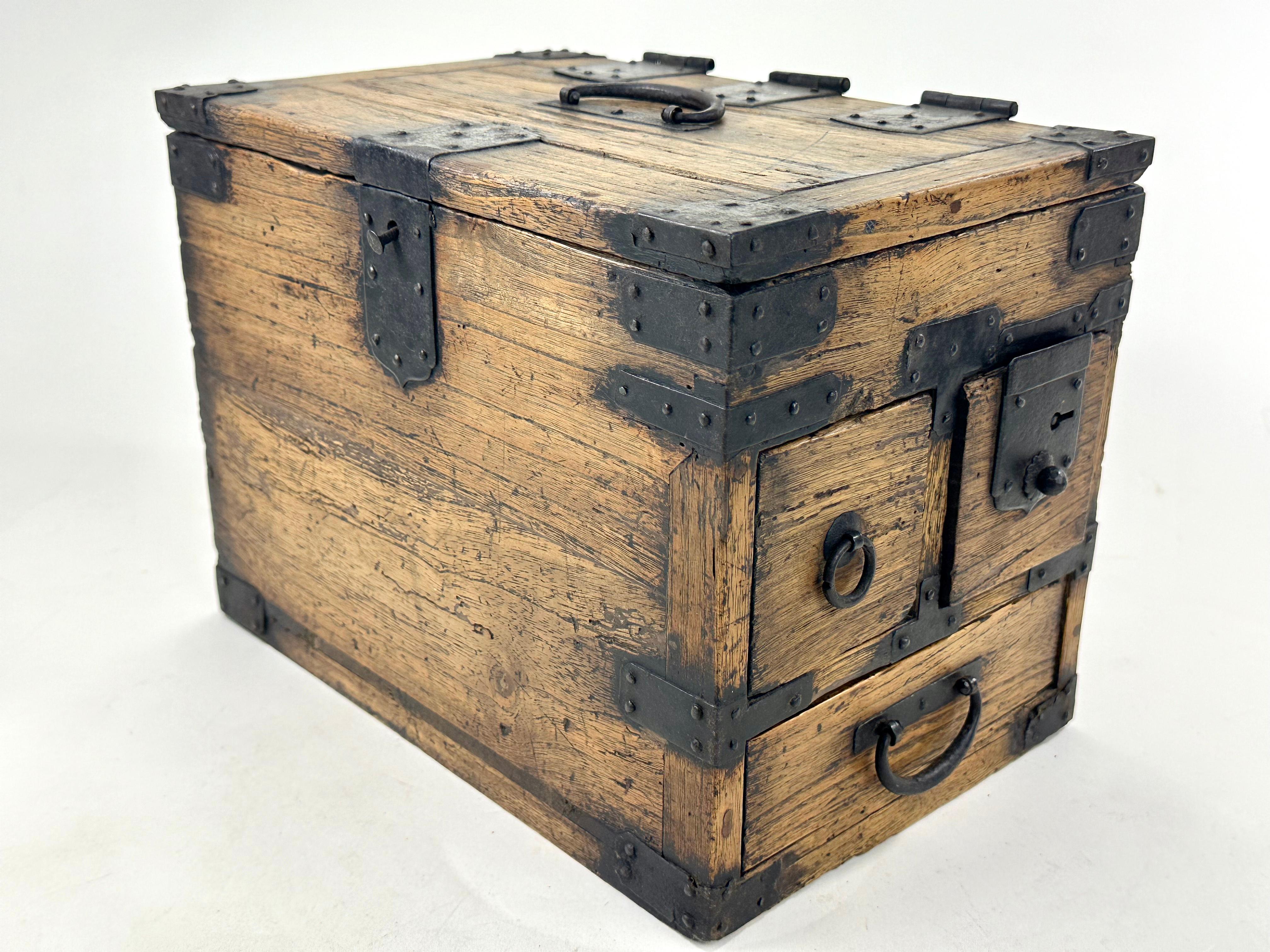 Available from Shogun's Gallery in Portland, Oregon for over 40 years specializing in Asian Arts & Antiques.

This is a 150 year old antique Japanese suzuribako from the late Meiji Era (c. 1880’s). This suzuribako (portable calligraphy tansu) has