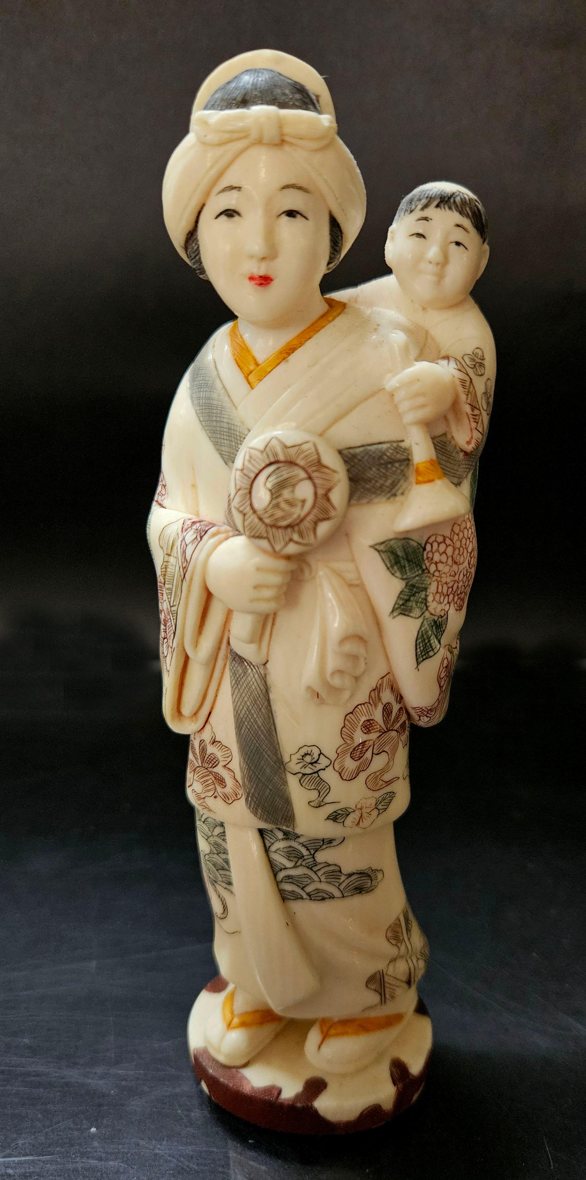 Antique Japanese Carved Okimono Polychrome Decorated Figure Group Mother & Son, Meiji Period 

This item is 2