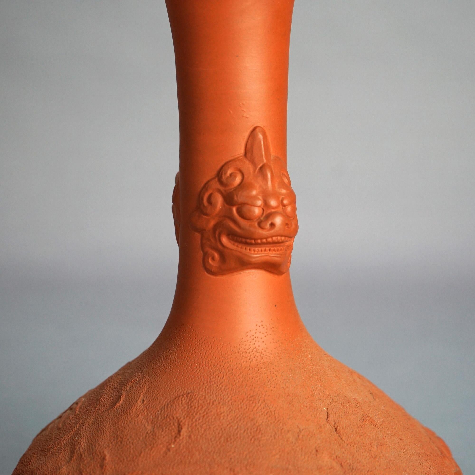 Antique Japanese Carved Relief Terra Cotta Vase with Mask & Dragon C1930

Measures - 11.75