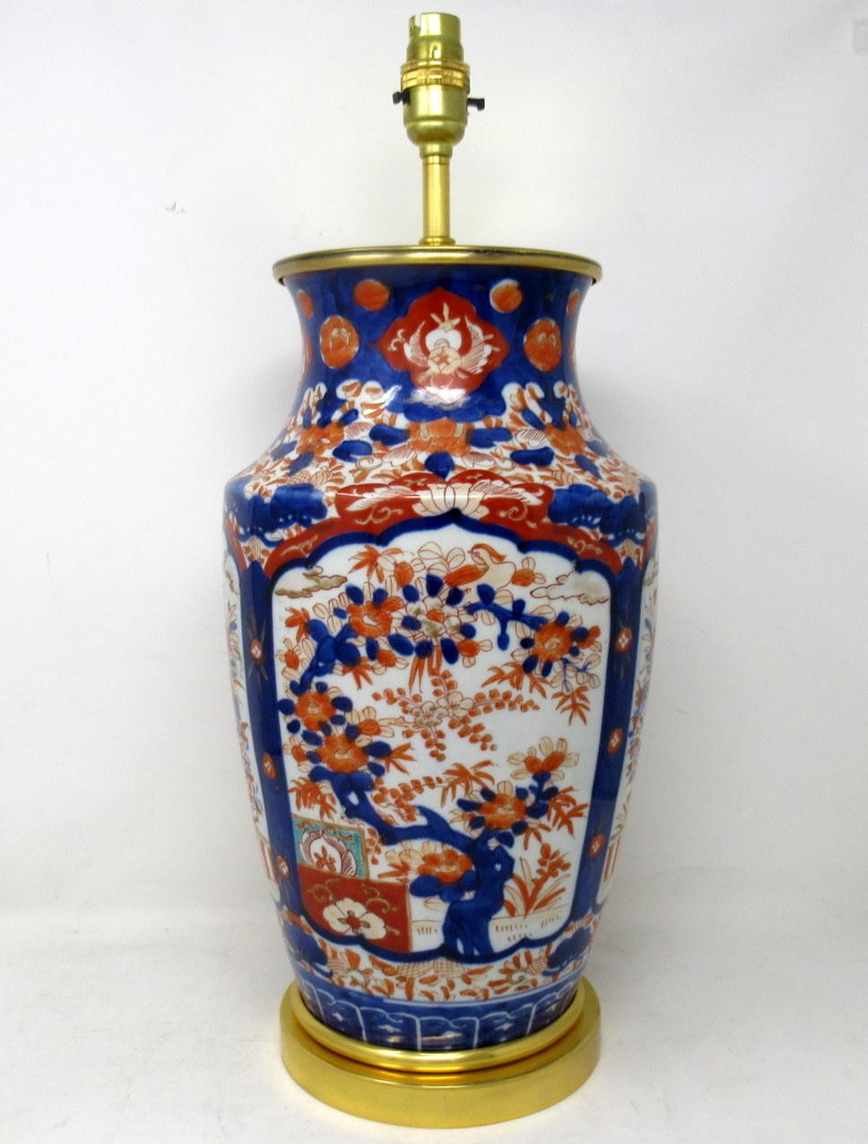 Stunning single traditional Japanese Imari Bulbous form porcelain vase of quite large proportions, now converted to an electric table lamp, complete with ormolu heavy gauge stepped circular base with attractive later ormolu mount. Second half of the