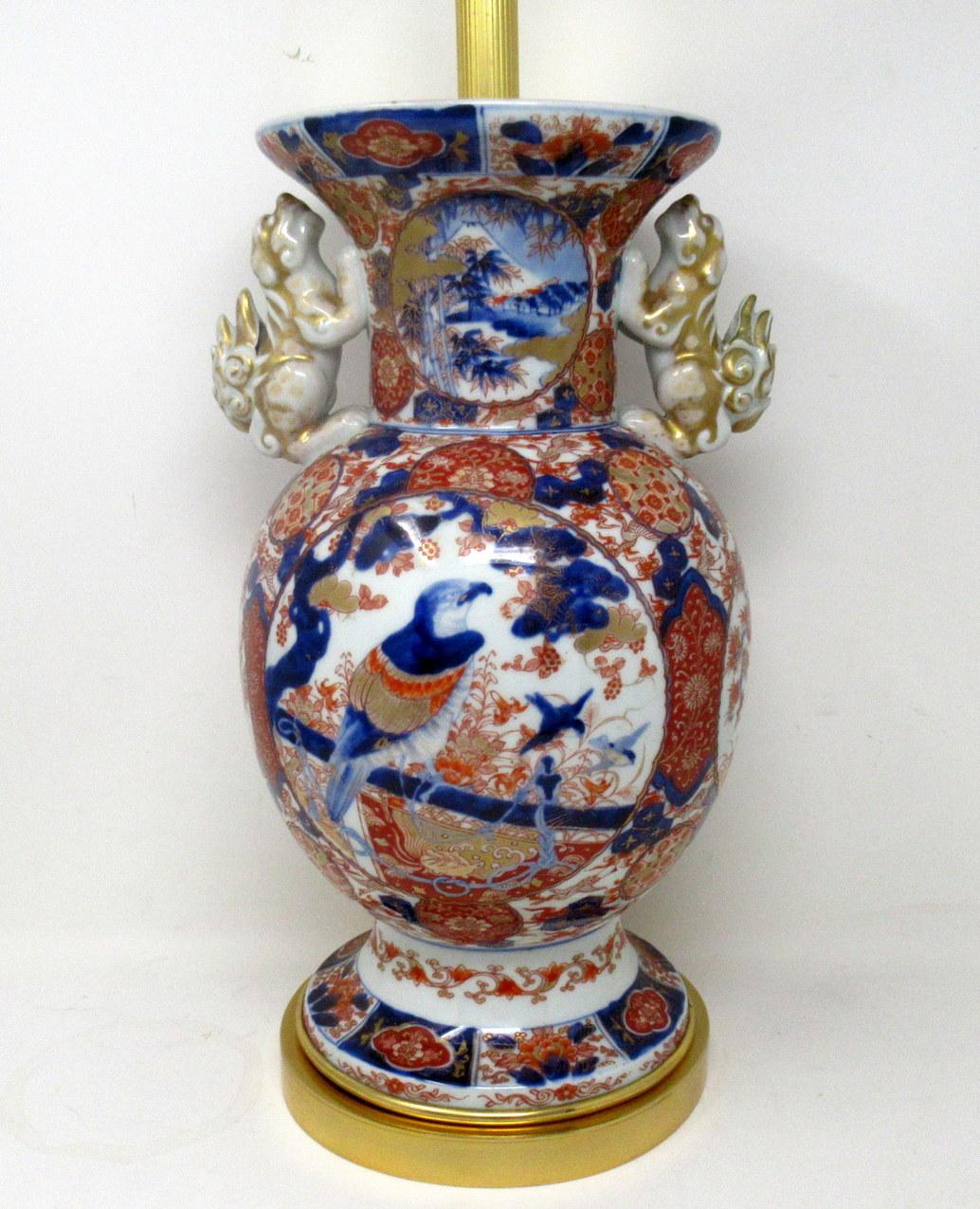 Stunning Single Traditional Japanese Imari Bulbous Form Porcelain vase of quite large proportions, the twin handles modelled as Foo Dogs, now converted to an electric Table Lamp, complete with ormolu heavy gauge stepped circular base with attractive