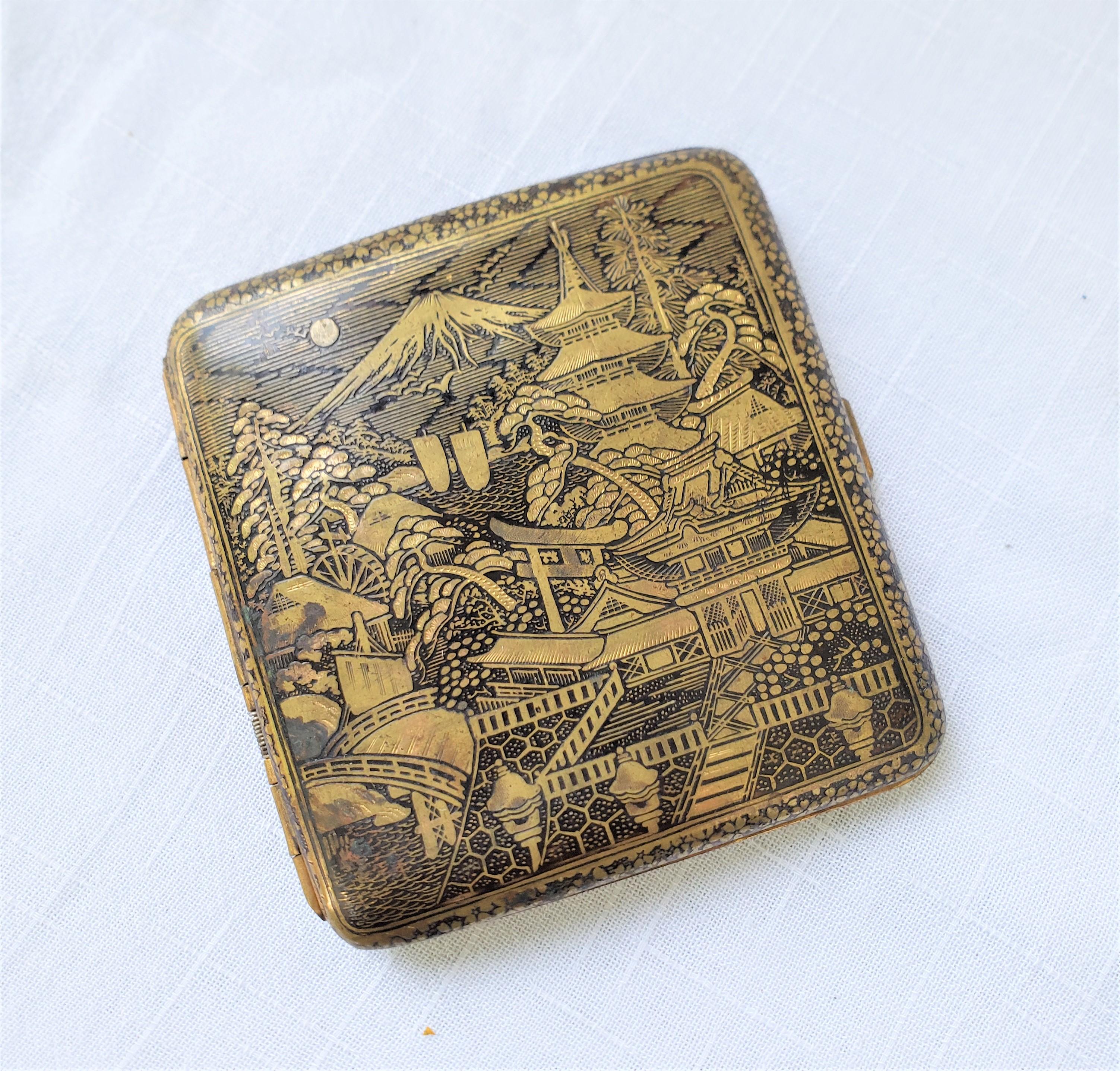 This antique cigarette case is unsigned by the maker, but presumed to have originated from Japan and date to approximately 1920 and done in the period Japanese Export style. The case is composed of metal with a hinged back and clasp and features