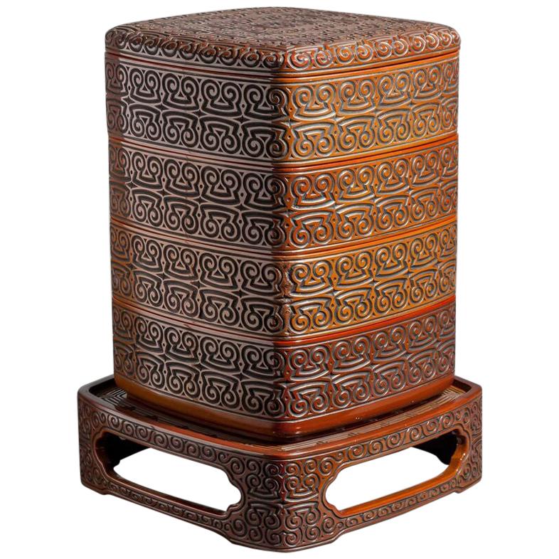 Antique Japanese Dramatically Carved and Lacquered Stack Box on Stand For Sale