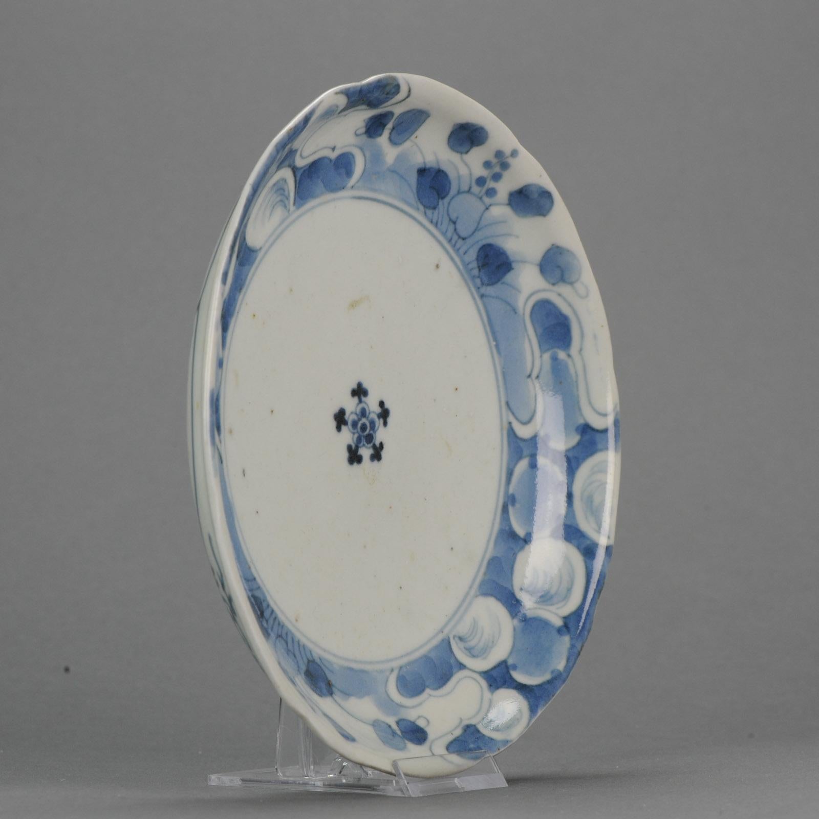 Lovely & High Quality Japanese Porcelain dish with a flower scene.

Additional information:
Material: Porcelain & Pottery
Type: Plates
Color: Blue & White
Region of Origin: Japan
Country of Manufacturing: Japan
Period: 17th century, 18th century Edo