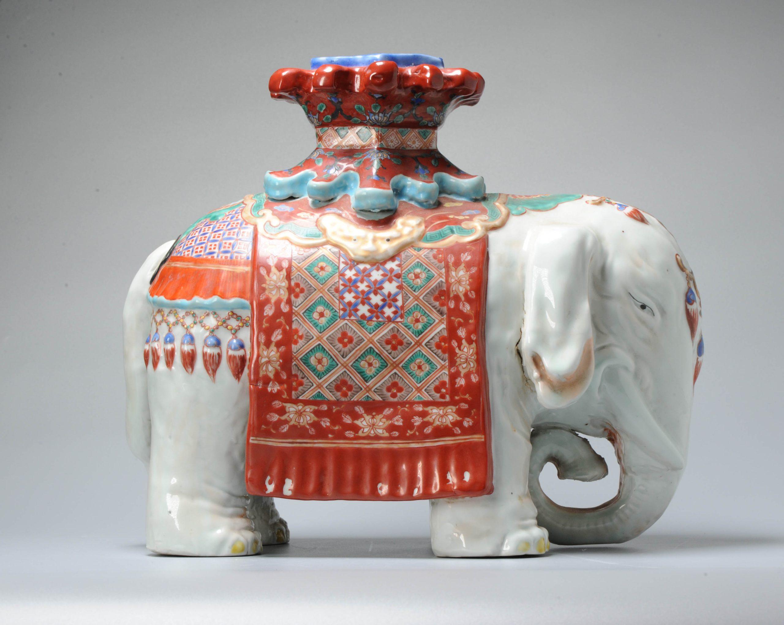 The kakiemon-style elephant carrying a pagoda on its back, with polychrome enamel decoration. For a similar elephant see.

Additional information:
Material: Porcelain & Pottery
Region of Origin: Japan
Original/Reproduction: Original
Period: 18th